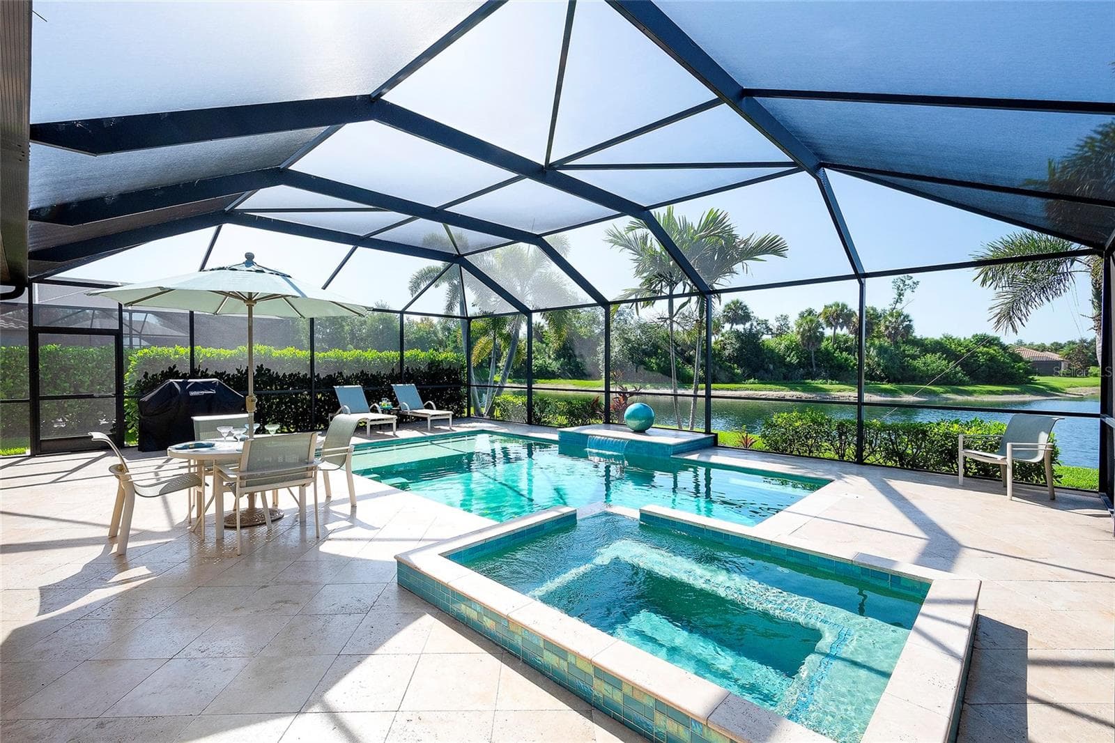 Outdoor Dining Space - 7130 QUIET CREEK DR, BRADENTON