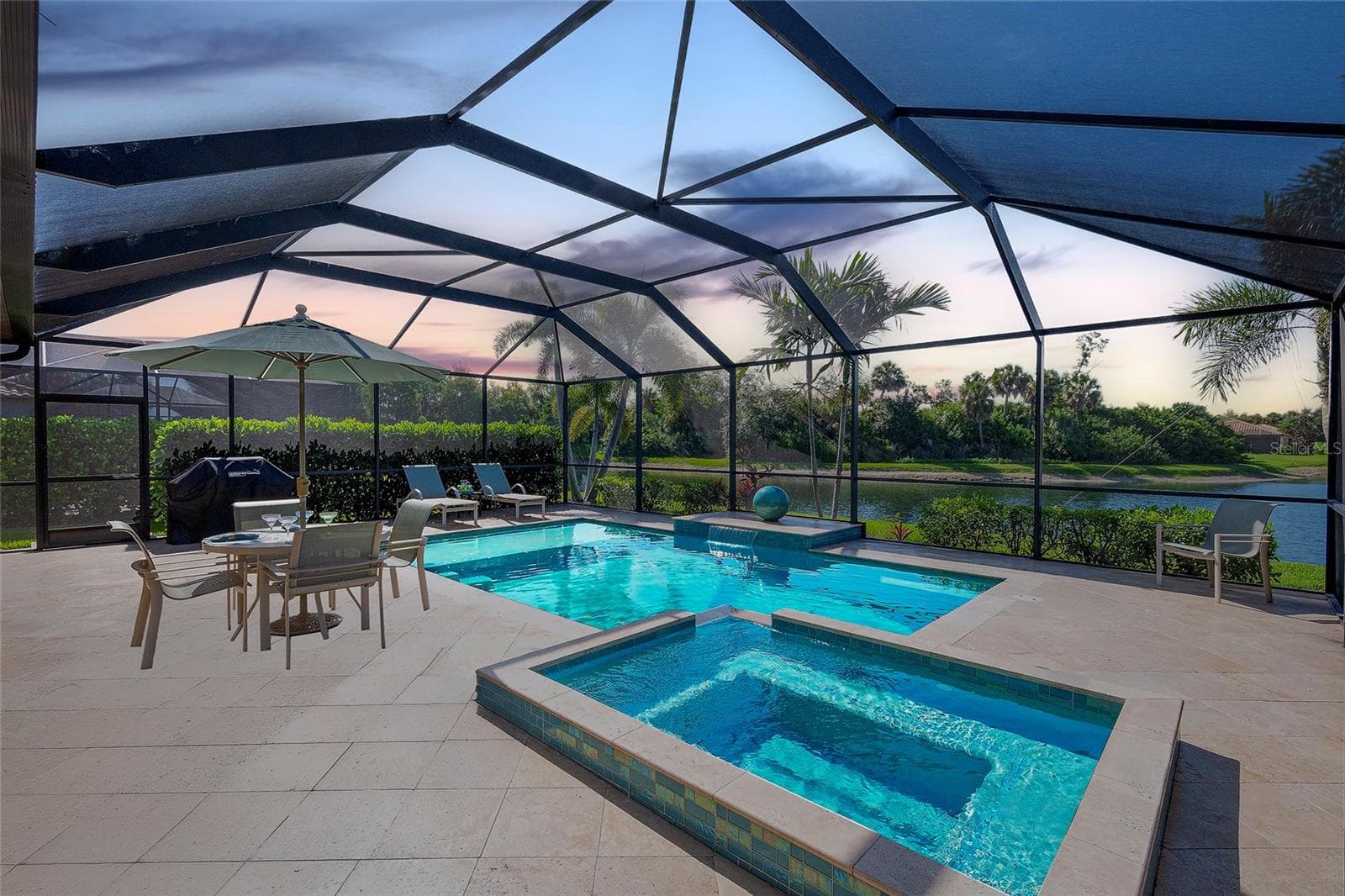 Pooll View at Dusk - 7130 QUIET CREEK DR, BRADENTON