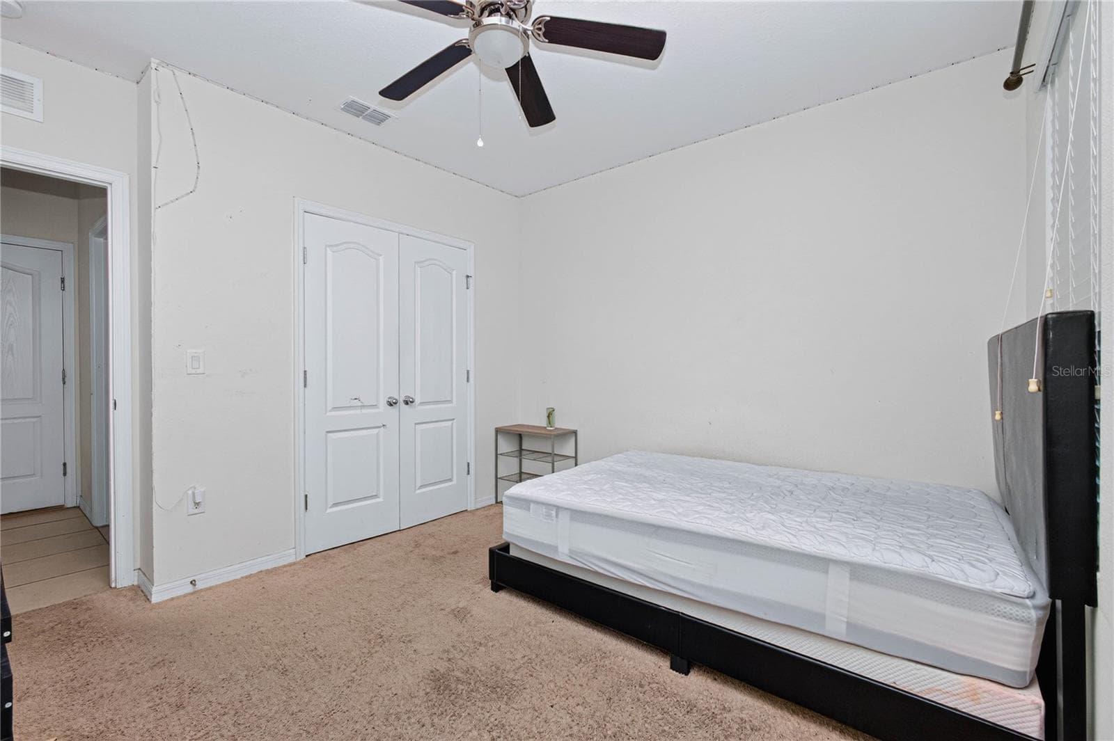 Bedroom 1 on 1st floor - 6022 GREY HERON DR, WINTER HAVEN