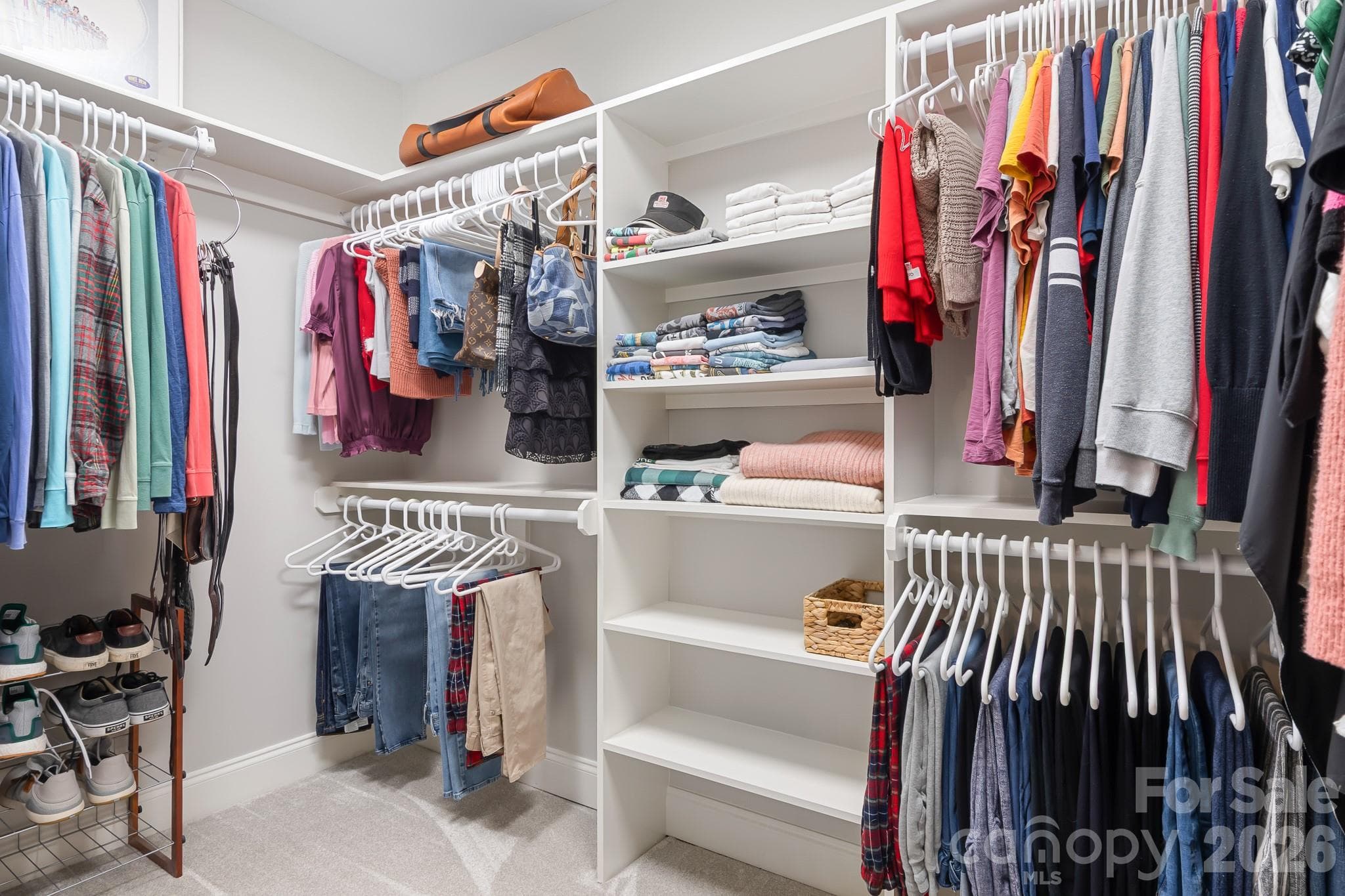 Custom Closet in Primary Bedroom - 7048 Mariners Court, Tega Cay