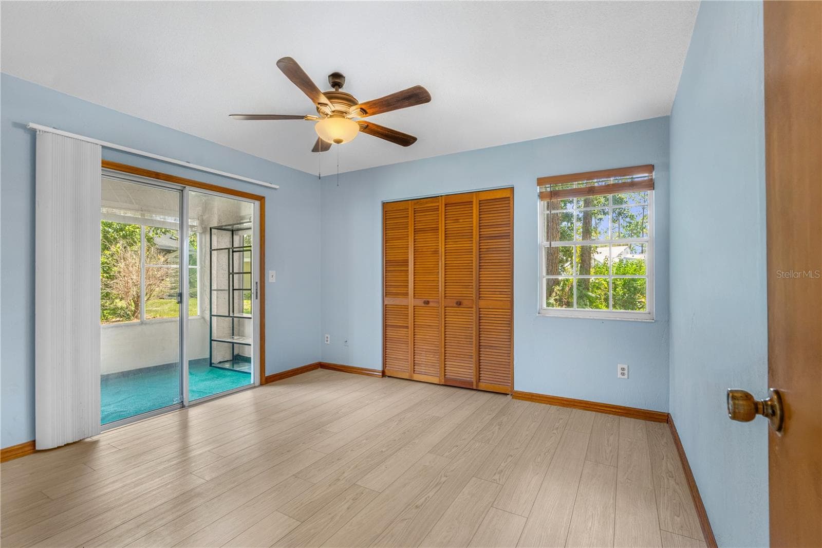 Guest Bedroom with Slider to FL Room - 104 SHOAL CREEK CIR, DAYTONA BEACH