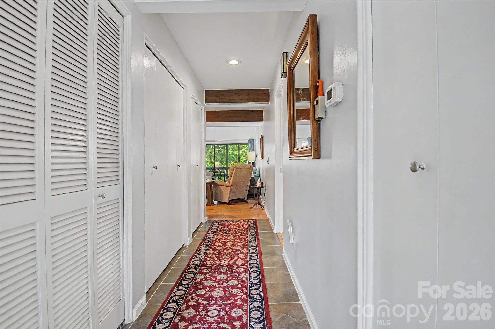 Hallway Entrance w/Storage - 8 Lakemoor Lane, Hendersonville