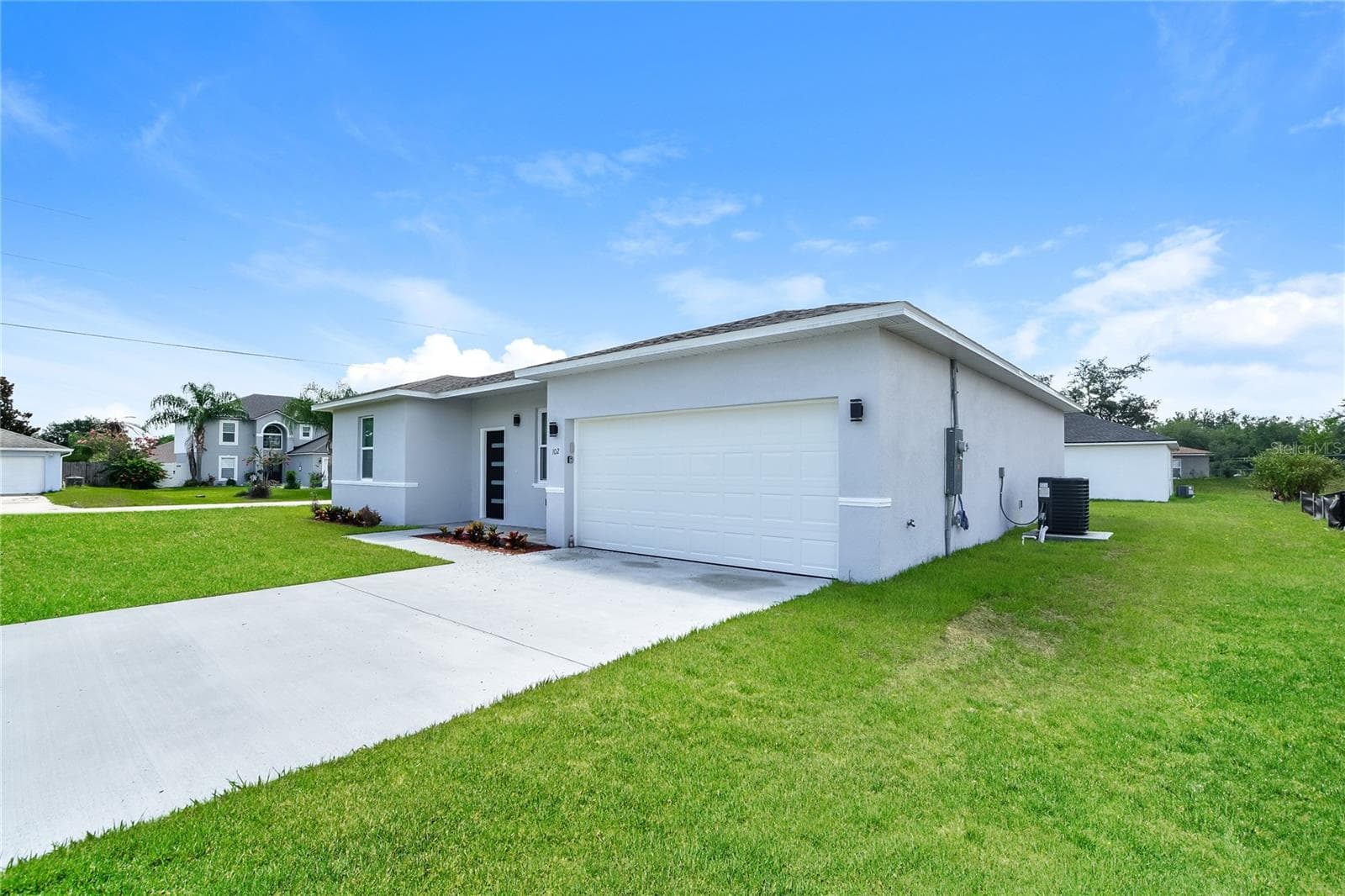 Single Family Residence at 102 CONCH WAY, POINCIANA, photo 2 of 15