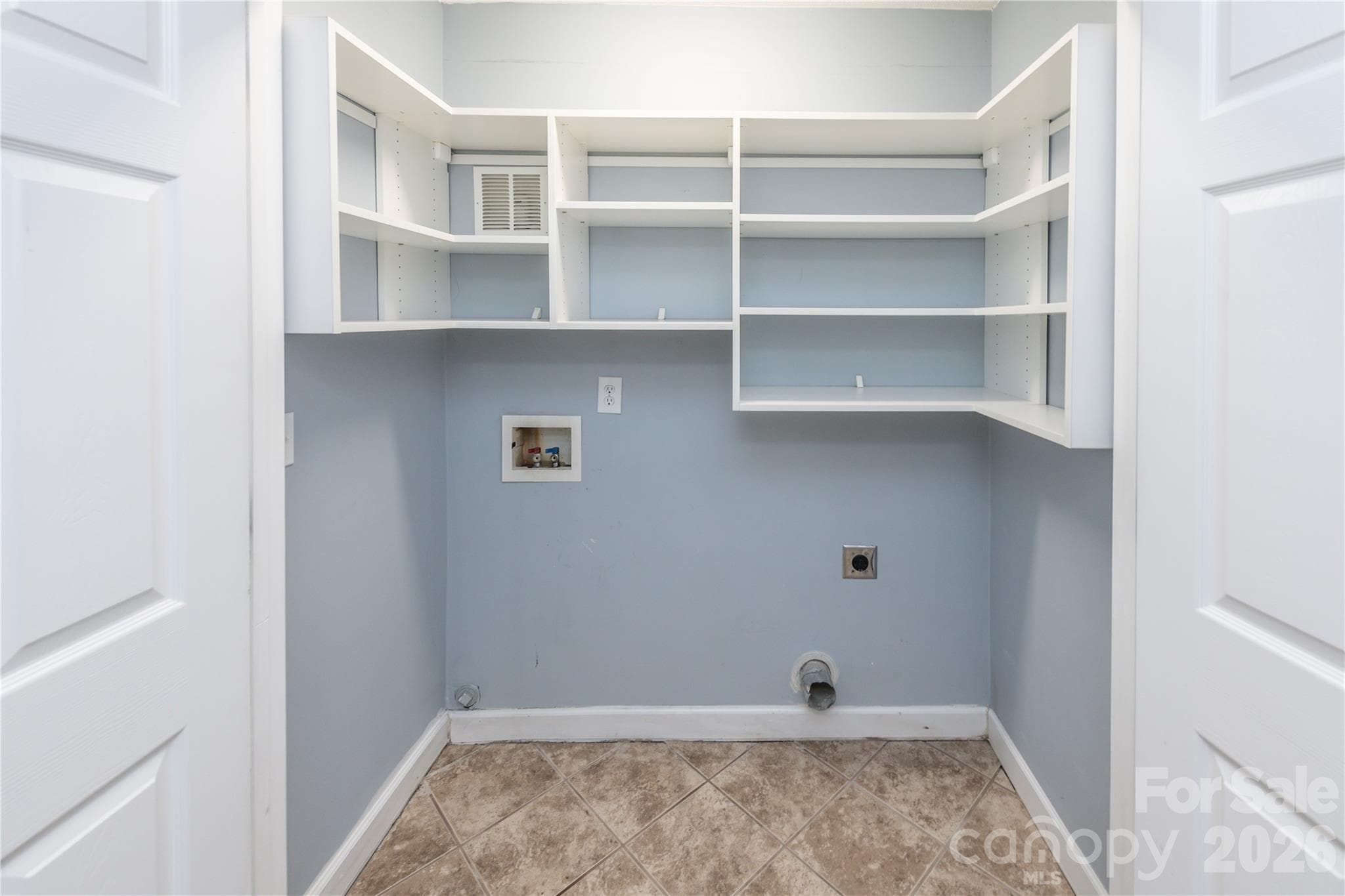 Laundry closet with shelving - 266 Kendra Drive SW, Concord
