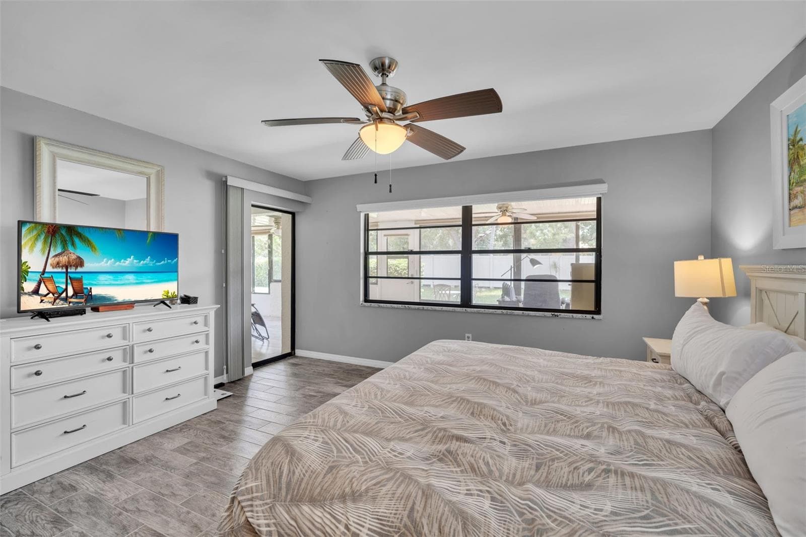 A door from the master bedroom to the lanai. - 1409 56TH ST W #1409, BRADENTON