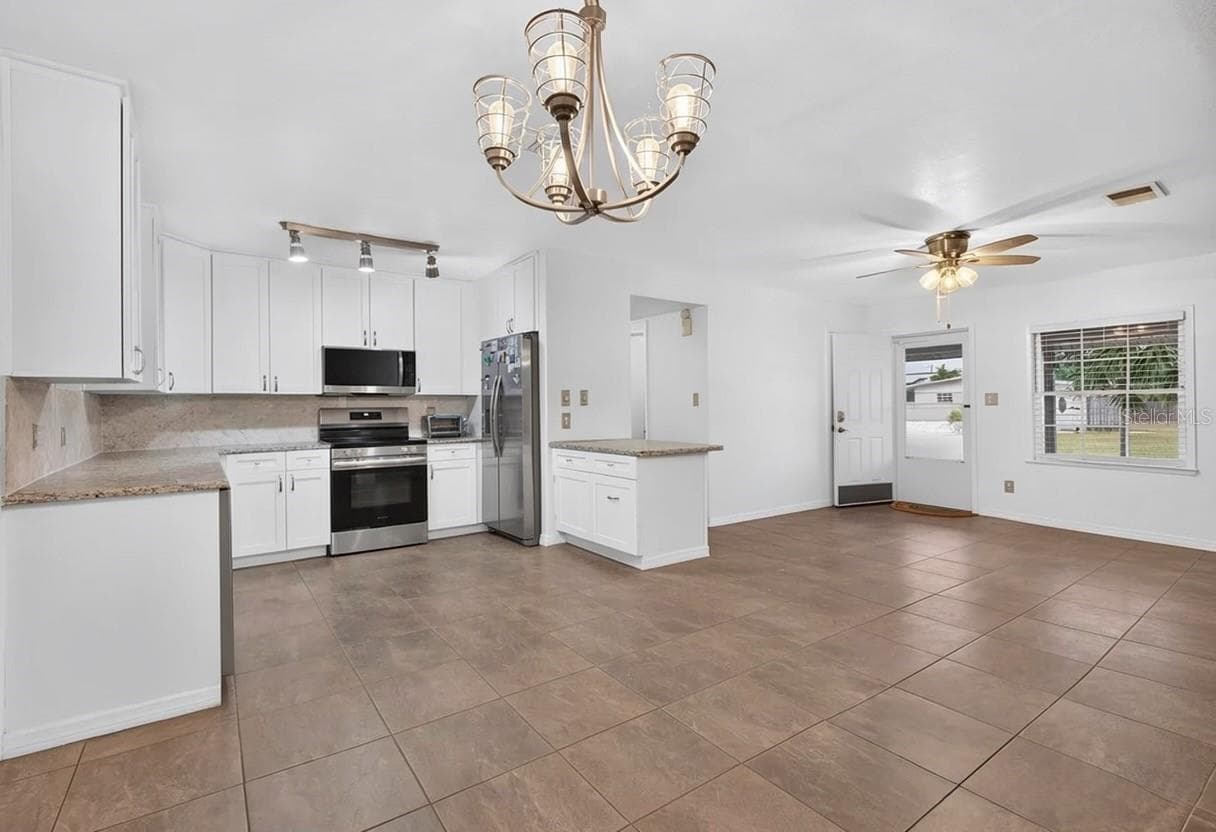 virtually unstaged - 5010 STOLLS AVE, TAMPA
