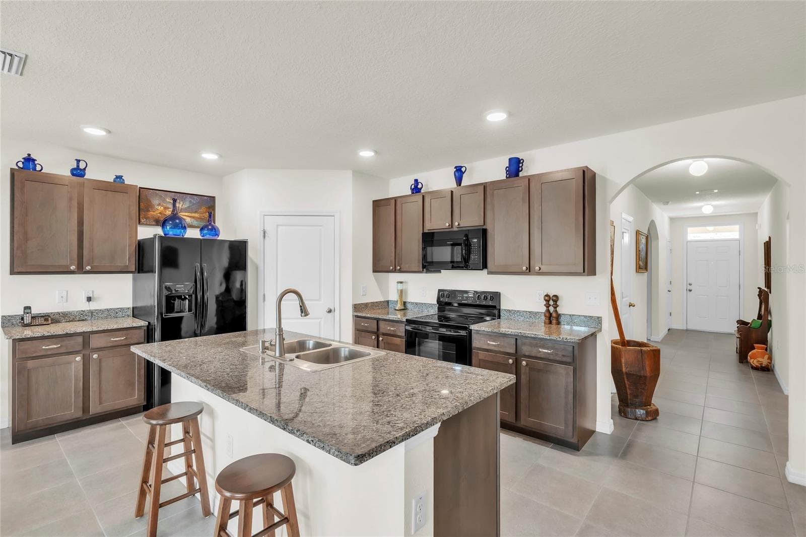 The heart of the home, ready for your first meal. - 9527 SUNSTONE BLVD, THONOTOSASSA