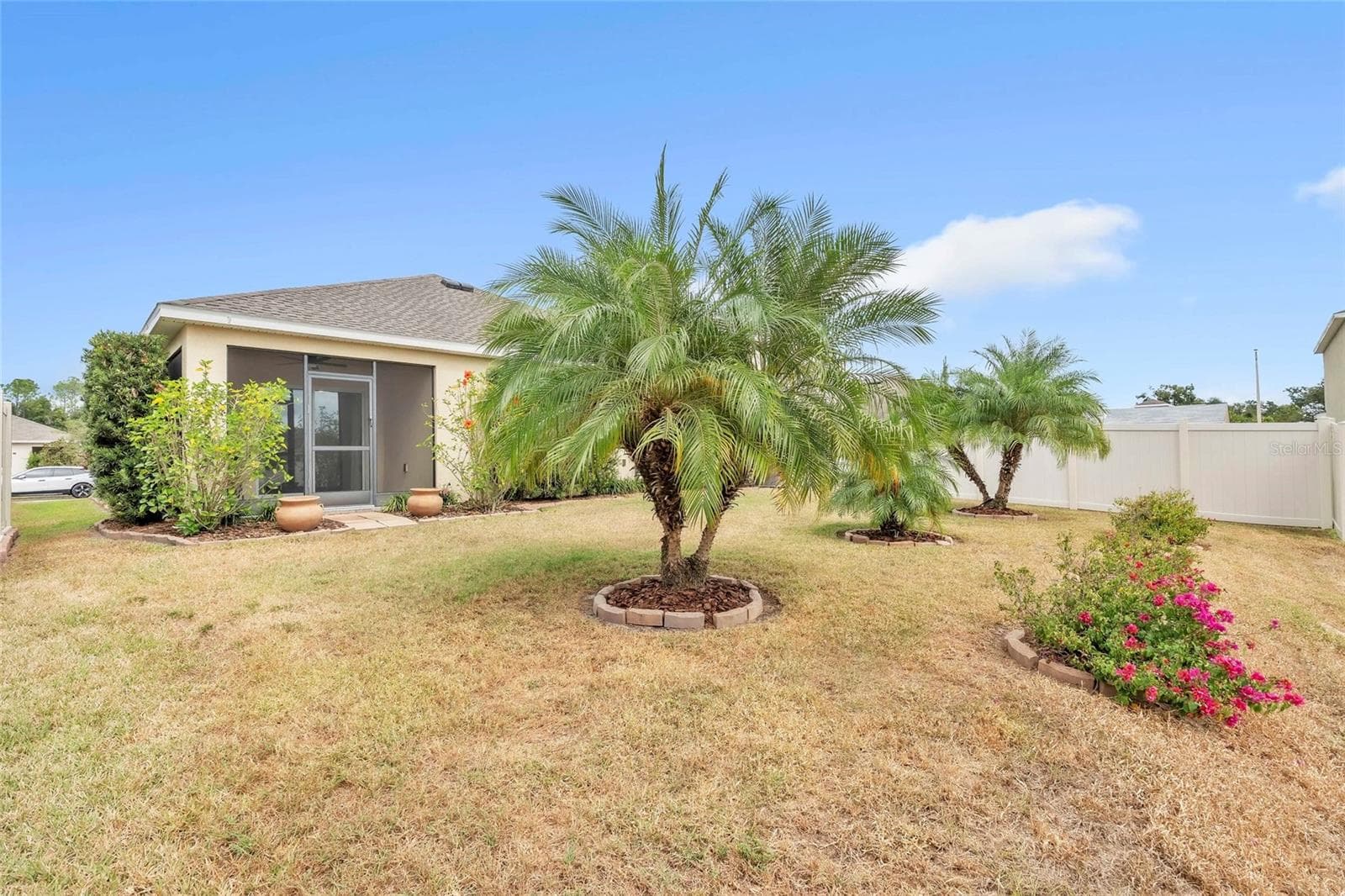 Private, lush, and ready for weekend mornings. - 9527 SUNSTONE BLVD, THONOTOSASSA