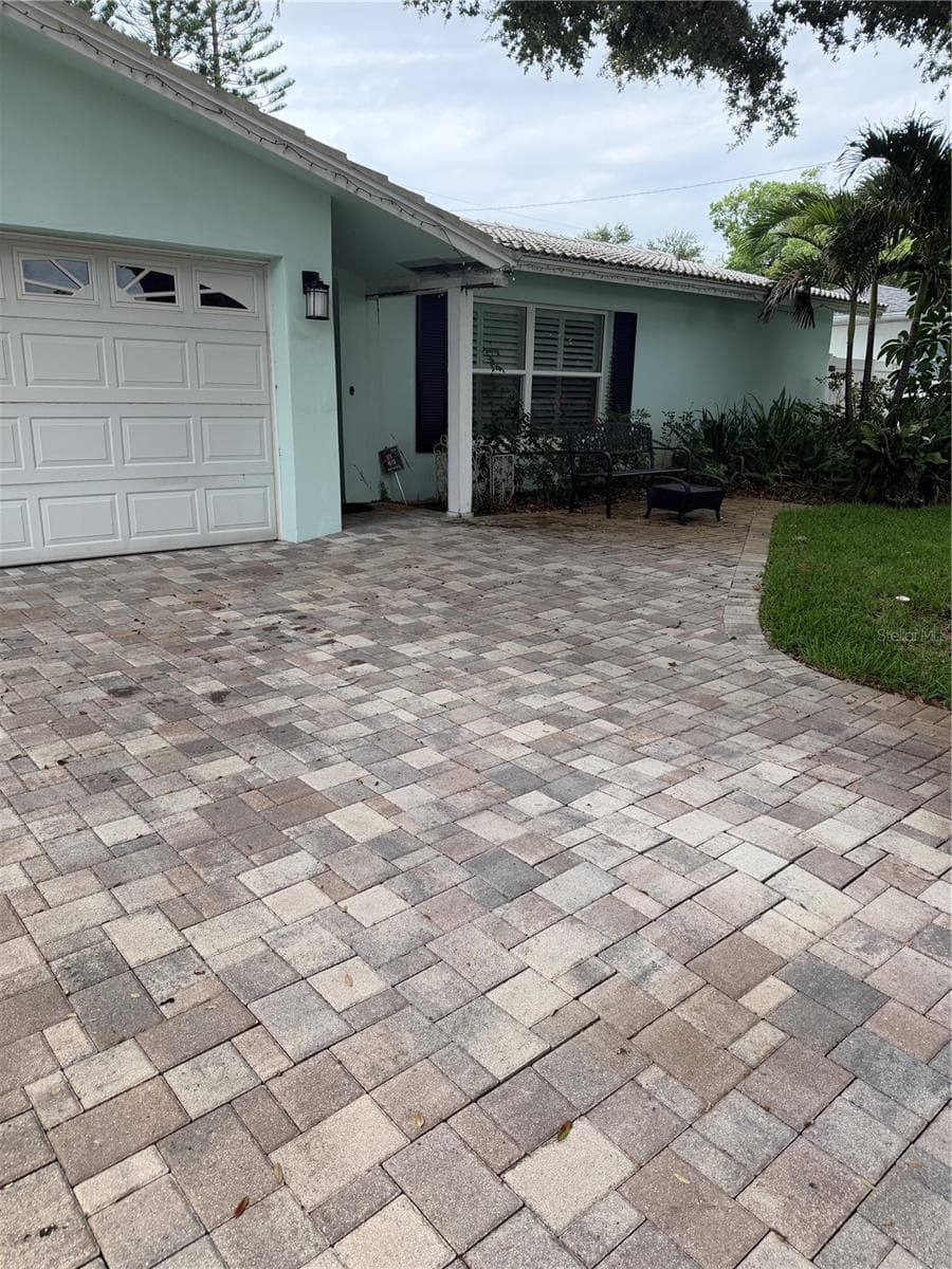 New pavers in driveway and walkway to the entrance. - 704 23RD ST SW, LARGO