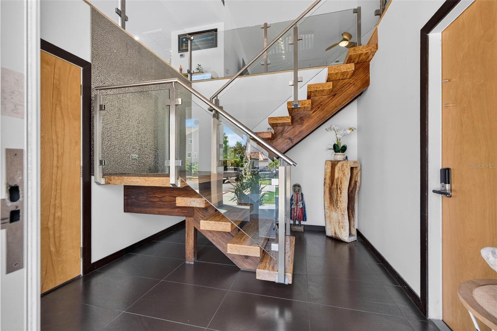 Elevator access to all 3 floors. - 113 7TH ST E, ST PETERSBURG
