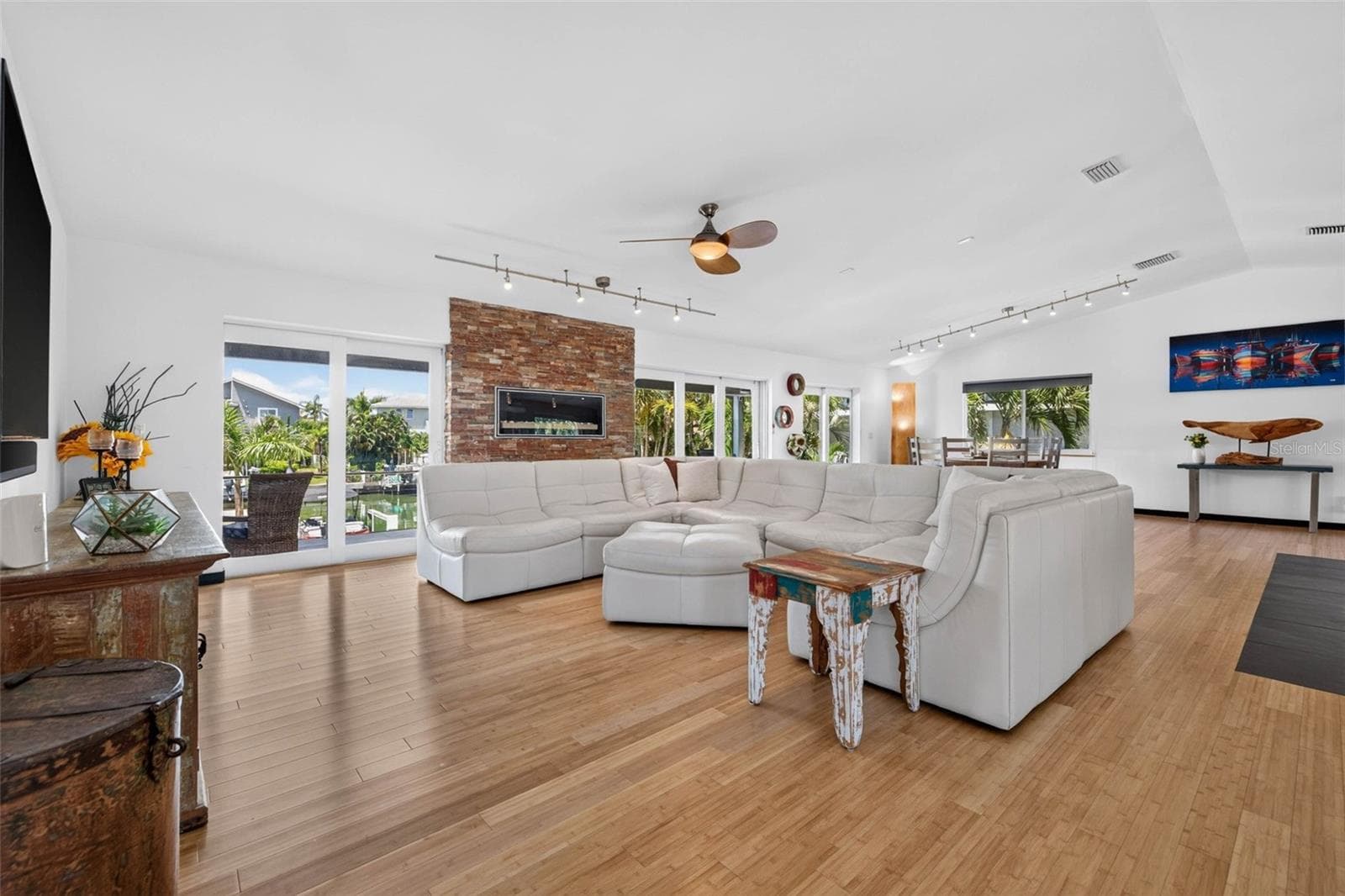 Open living area with tons of natural light. - 113 7TH ST E, ST PETERSBURG
