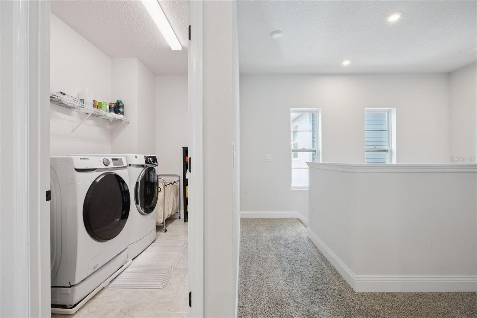 Second Level Laundry Room with additional storage. - 2954 JOURNEY PL, ST CLOUD