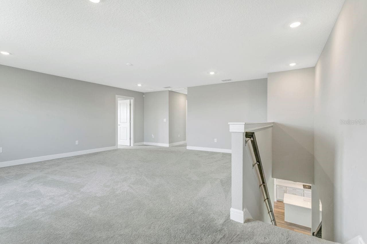 Huge Loft space on the 2nd floor - perfect for 2nd living area, media room, game room, etc - 9909 LONGMEADOW AVE, PARRISH