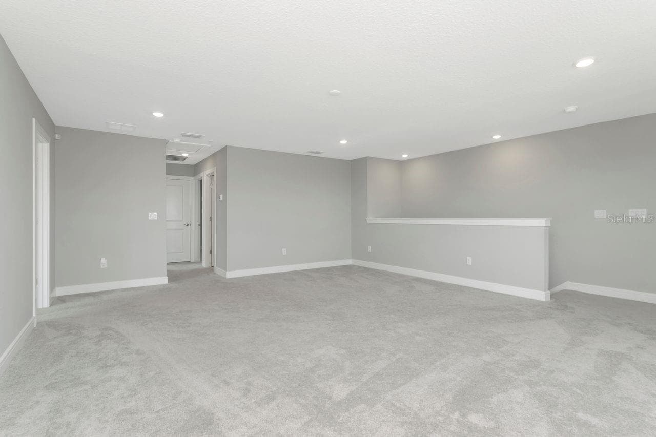 Huge Loft space on the 2nd floor - perfect for 2nd living area, media room, game room, etc - 9909 LONGMEADOW AVE, PARRISH