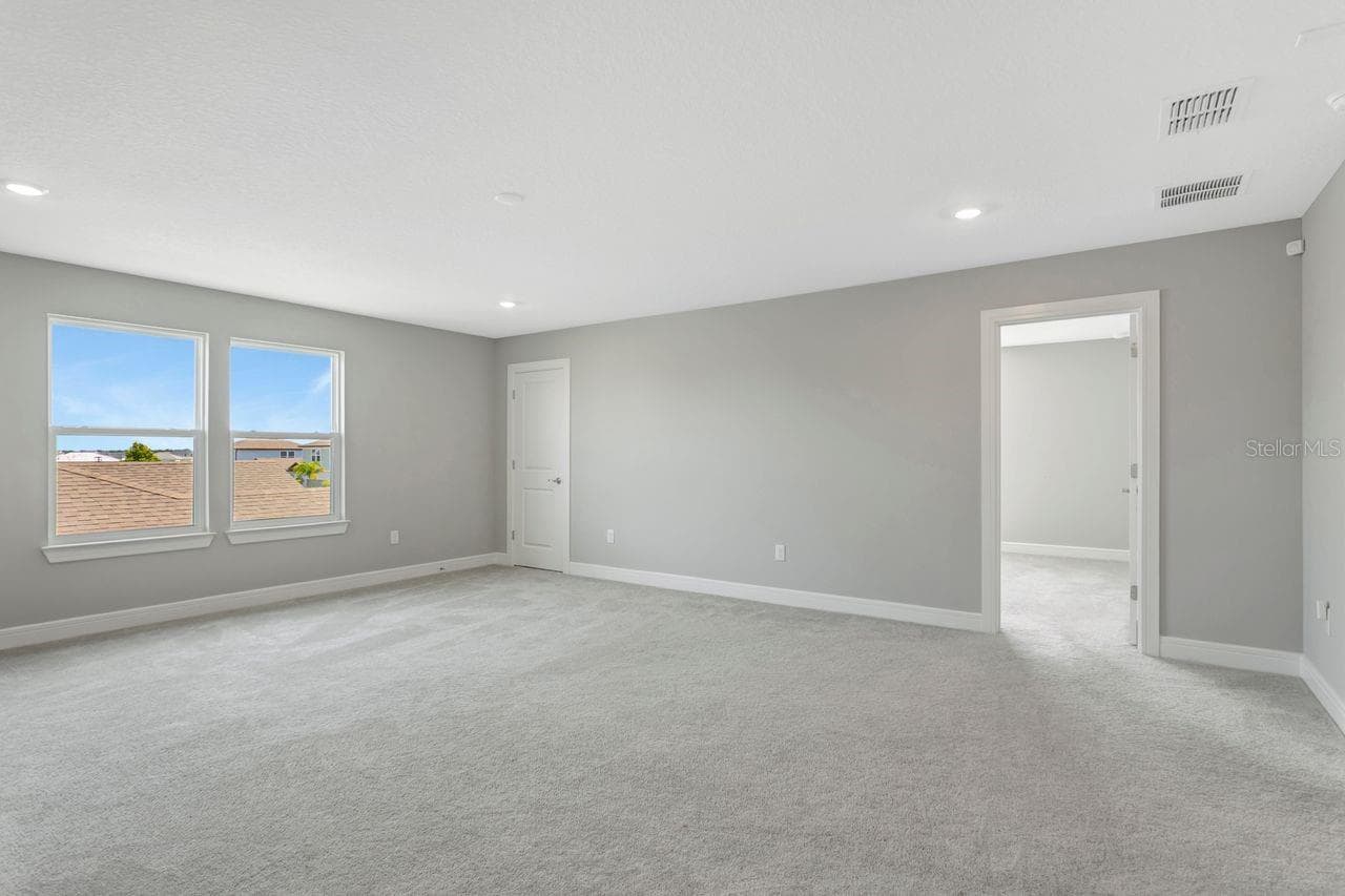 Huge Loft space on the 2nd floor - perfect for 2nd living area, media room, game room, etc - 9909 LONGMEADOW AVE, PARRISH