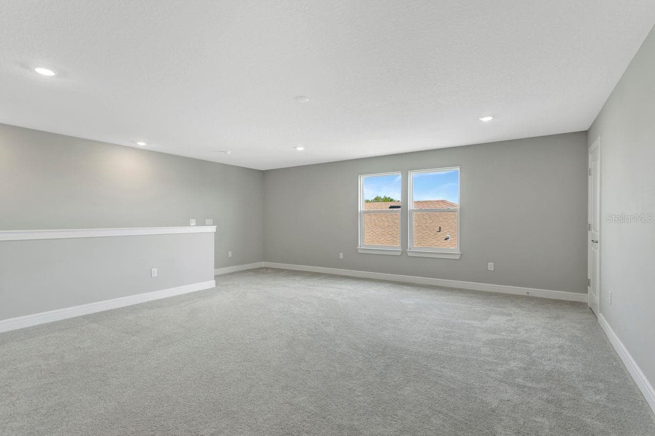 Huge Loft space on the 2nd floor - perfect for 2nd living area, media room, game room, etc - 9909 LONGMEADOW AVE, PARRISH