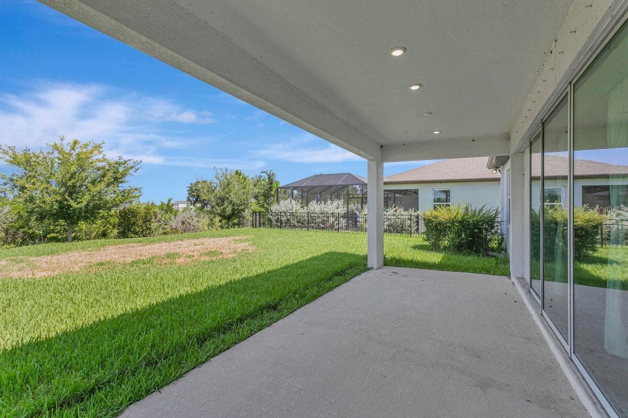Large, under roof lanai with beautiful sunset views - 9909 LONGMEADOW AVE, PARRISH