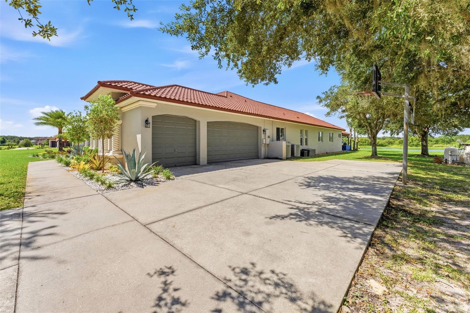 3 Car Garage With Side Entry - 24355 HIDEOUT TRL, LAND O LAKES