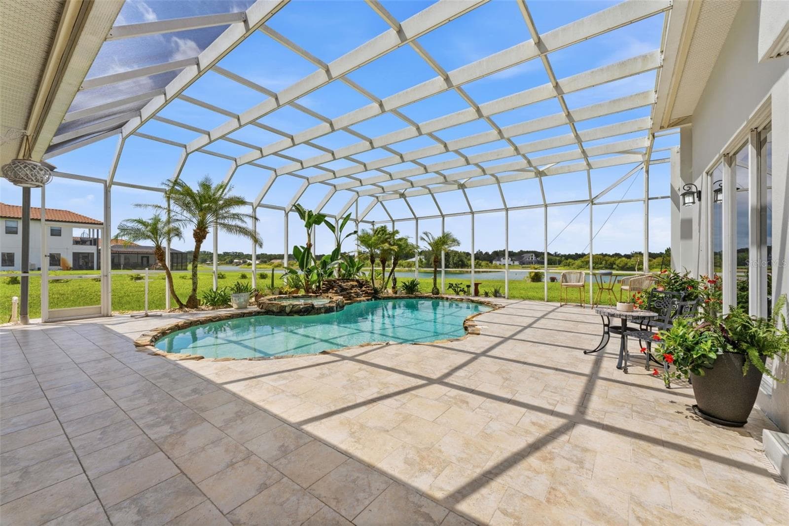 Experience peace and beauty every single day in this stunning home. - 24355 HIDEOUT TRL, LAND O LAKES