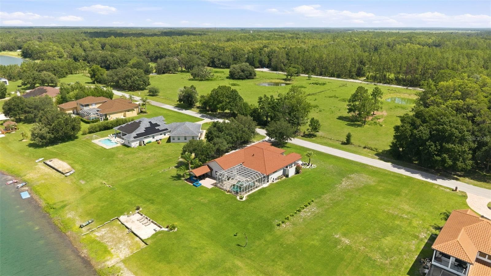 This oversized, spacious lot offers a rare opportunity and serves as a highly desirable commodity - 24355 HIDEOUT TRL, LAND O LAKES