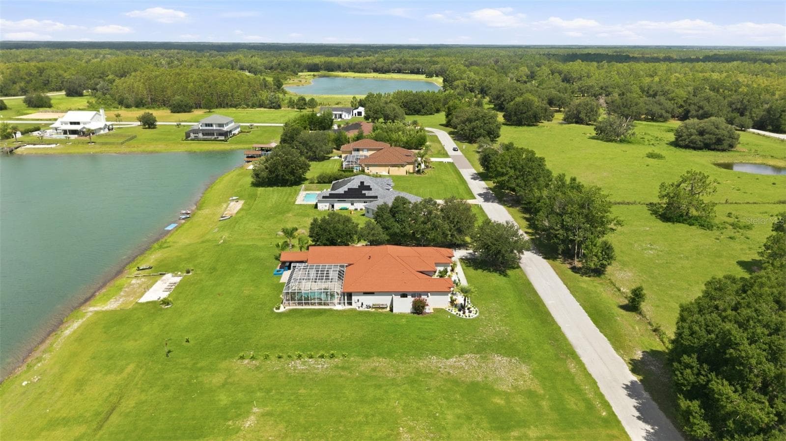 Private, Well-Spaced Home Site Offering Peace and Privacy - 24355 HIDEOUT TRL, LAND O LAKES