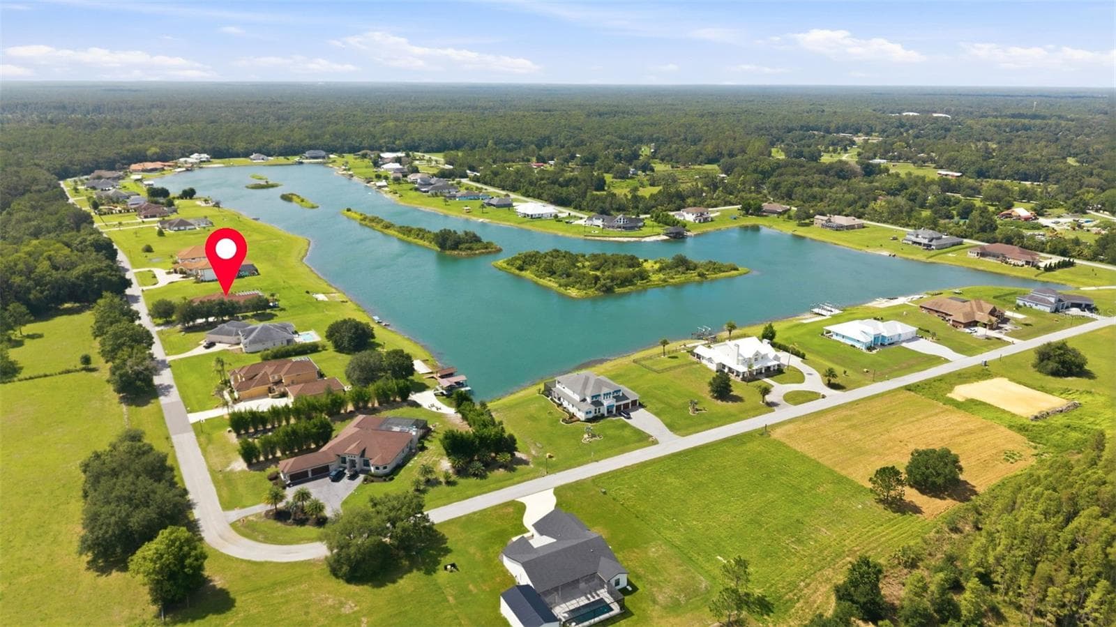 Your Opportunity to Live In a Well Spaced Ski Lake Community Beaming With Natural Beauty - 24355 HIDEOUT TRL, LAND O LAKES