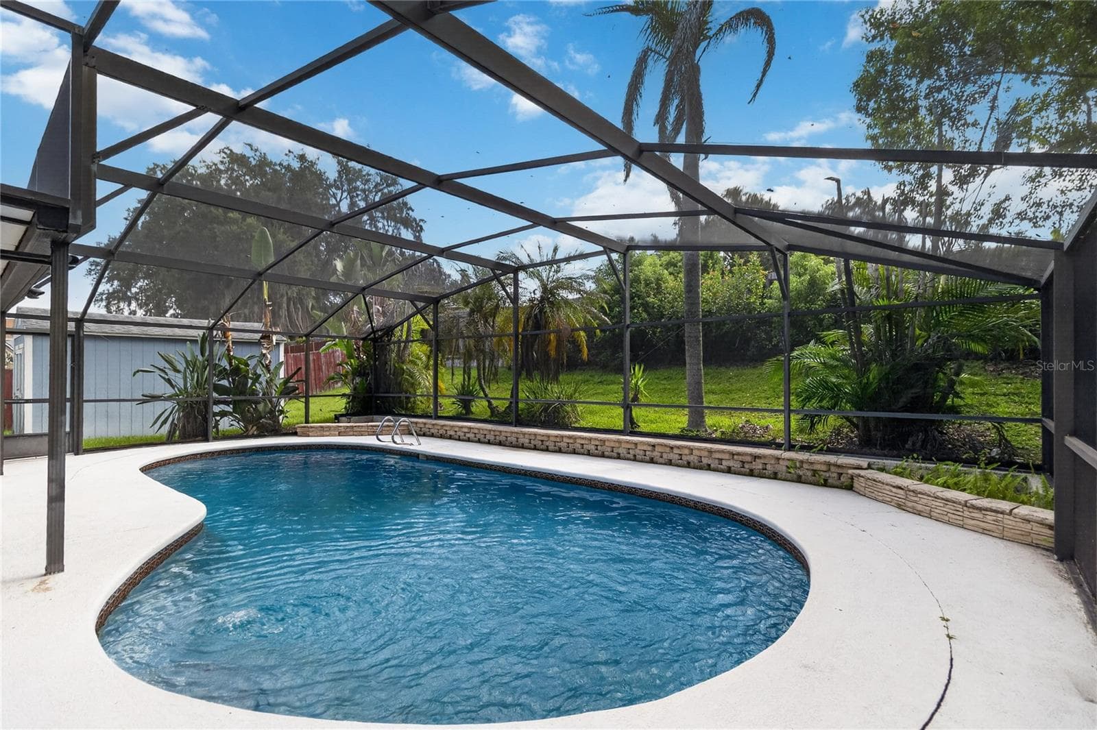 Pool view brings tranquility and calm. 10x16 Tuff Shed to the left (added shelves & hurricane protection) - 656 LITTLE WEKIVA RD, ALTAMONTE SPRINGS