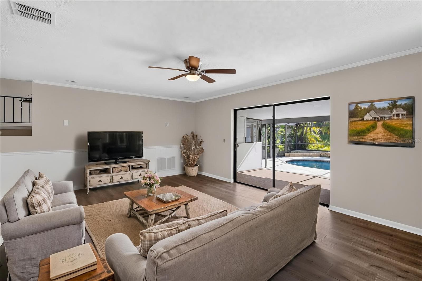 Living Room (14x20) is open and bright with pool views (virtual furnishings) - 656 LITTLE WEKIVA RD, ALTAMONTE SPRINGS