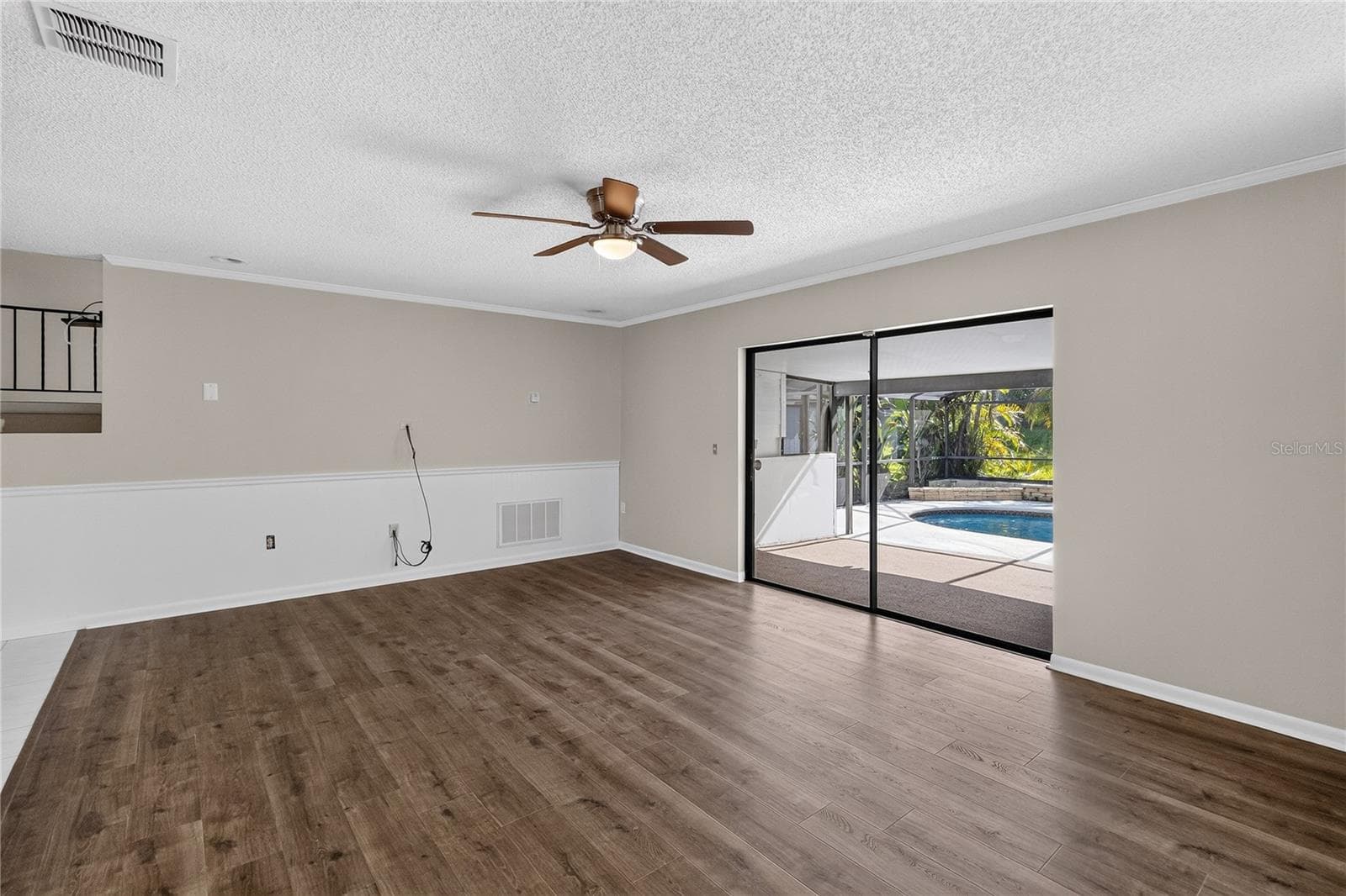 View 2 Living Room (14x20) is open and bright with pool views - 656 LITTLE WEKIVA RD, ALTAMONTE SPRINGS