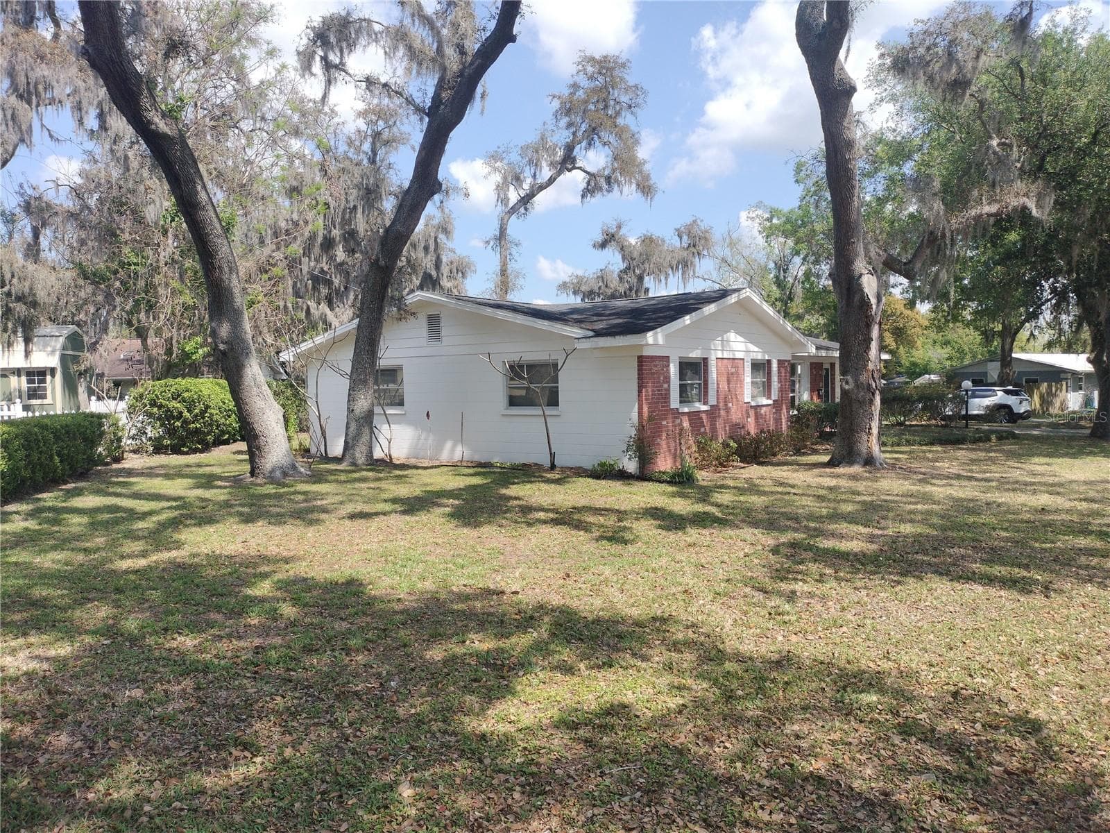 Front/Side of house - 39133 5TH AVE, ZEPHYRHILLS