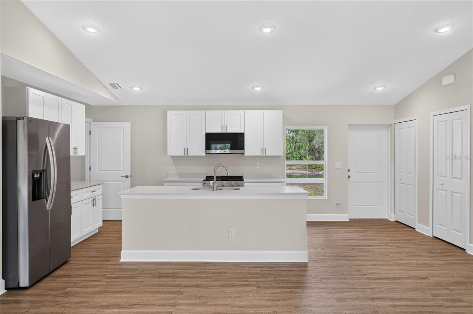 Kitchen with SS appliances - 23477 BRANCH AVE, PORT CHARLOTTE