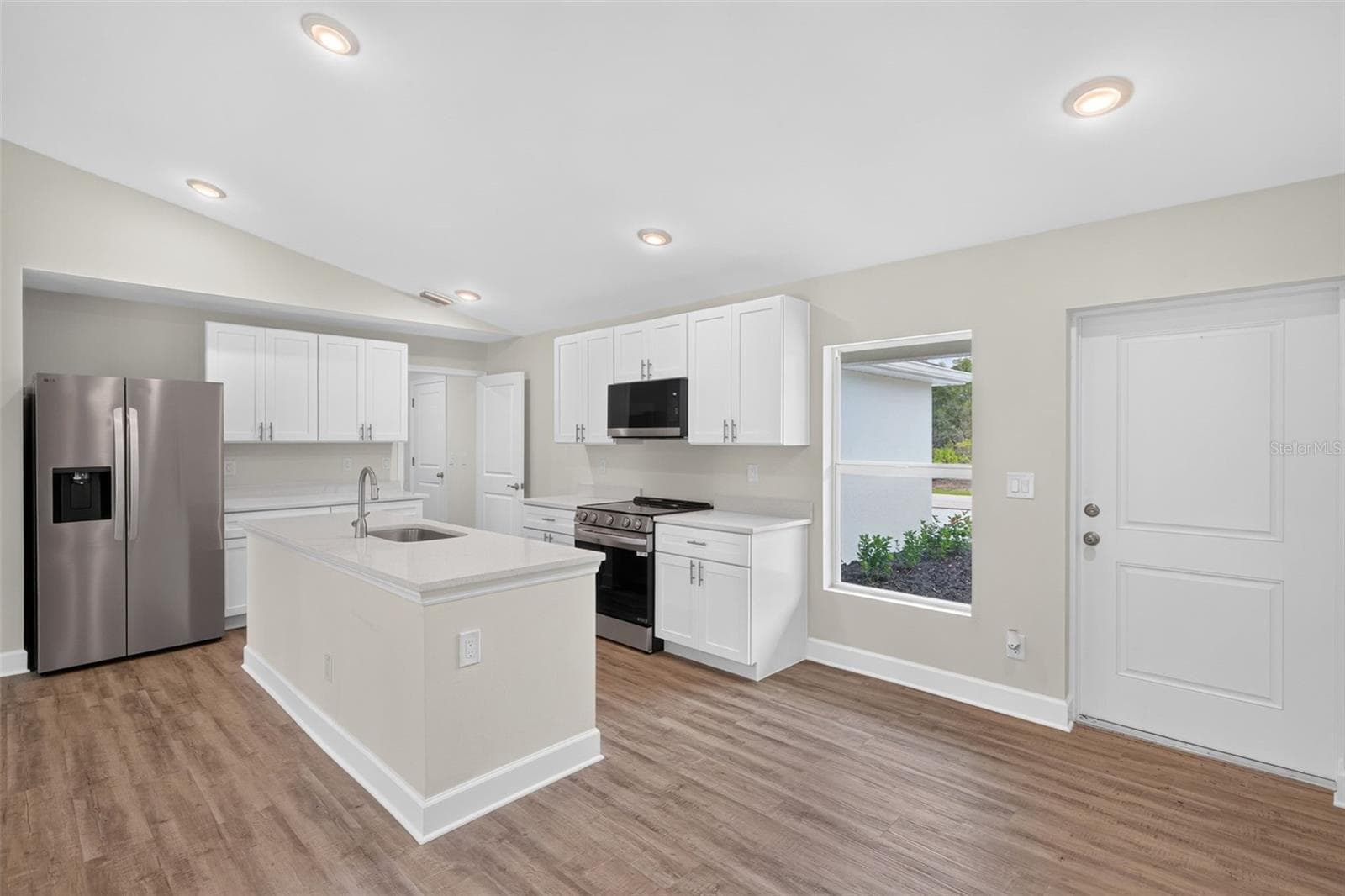 Kitchen with Quartz Counters - 23477 BRANCH AVE, PORT CHARLOTTE