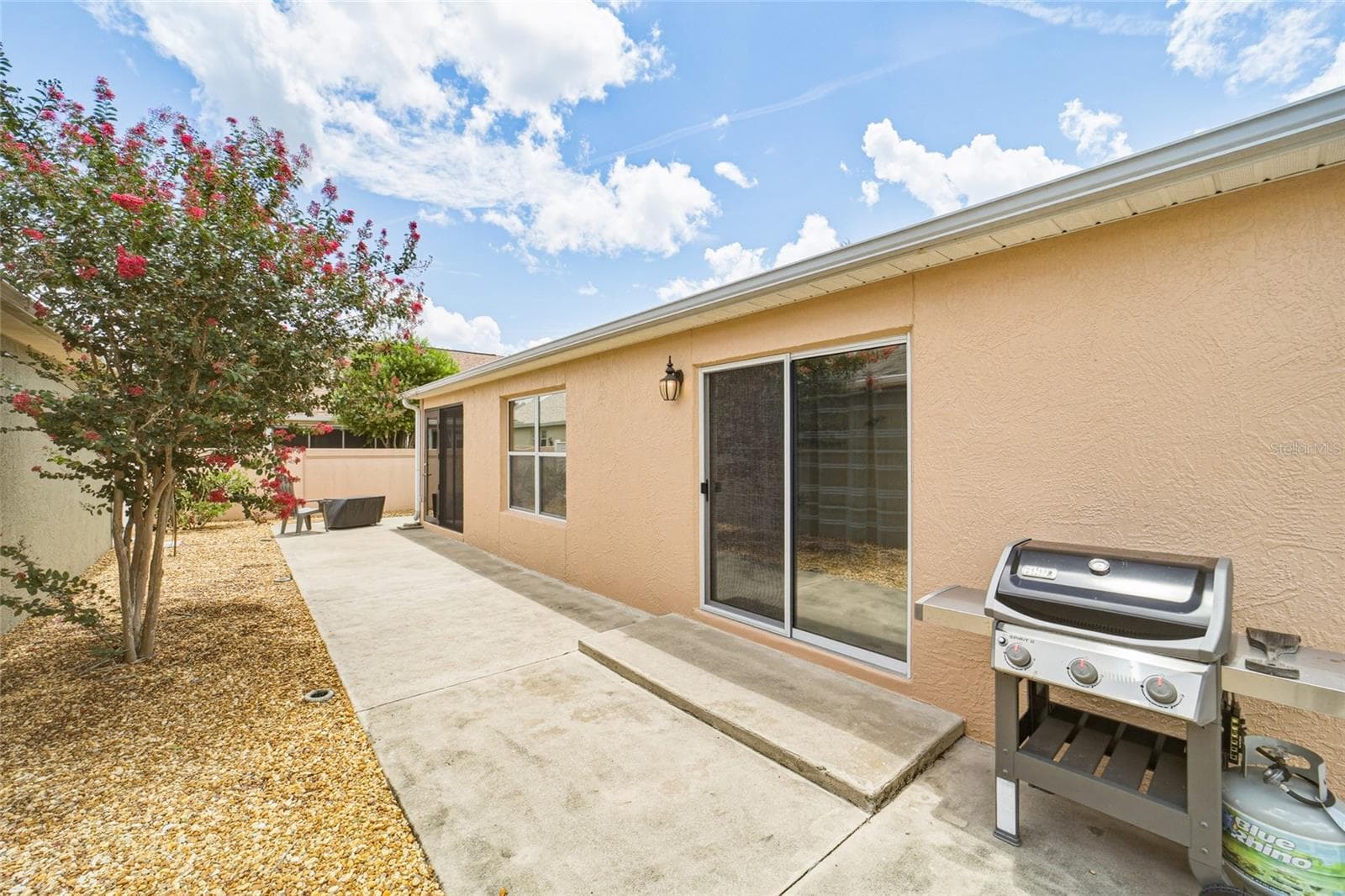 Side view of home-perfect grilling area - 308 ALMERIA ST, THE VILLAGES