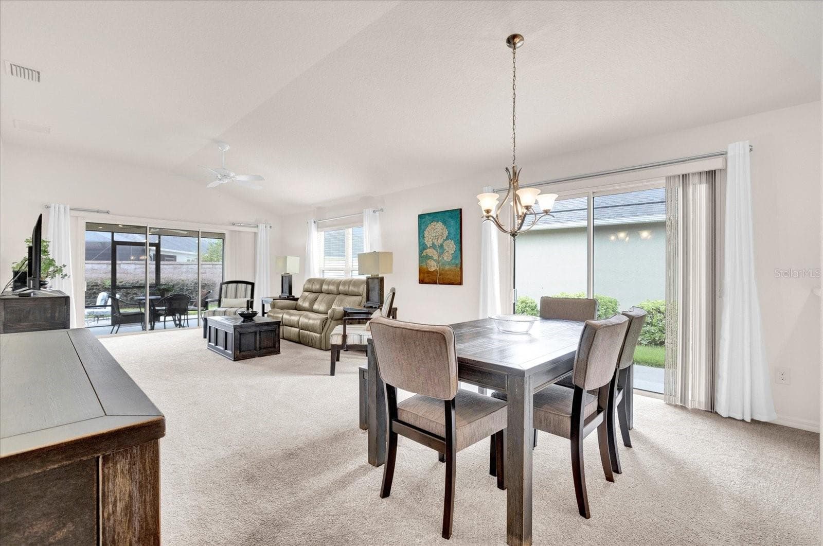 DINING AND LIVING ROOM - 2850 CHARLEVOIX ST, THE VILLAGES