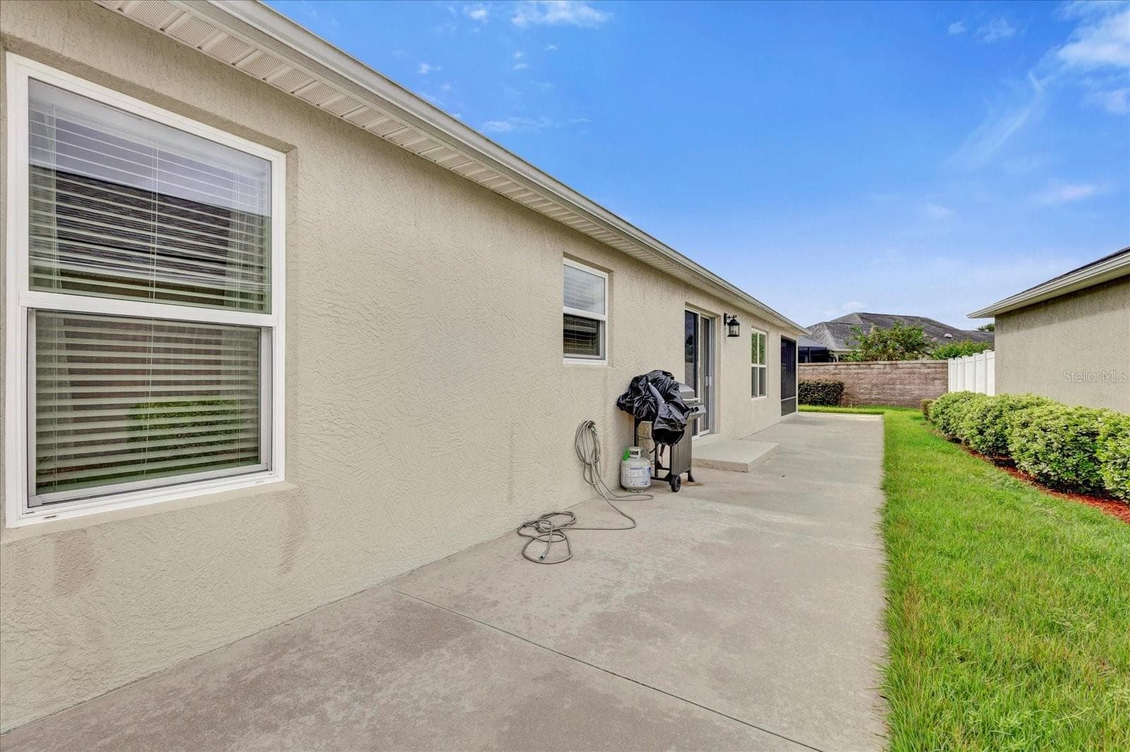 VIEW OF SIDE OF HOME - 2850 CHARLEVOIX ST, THE VILLAGES
