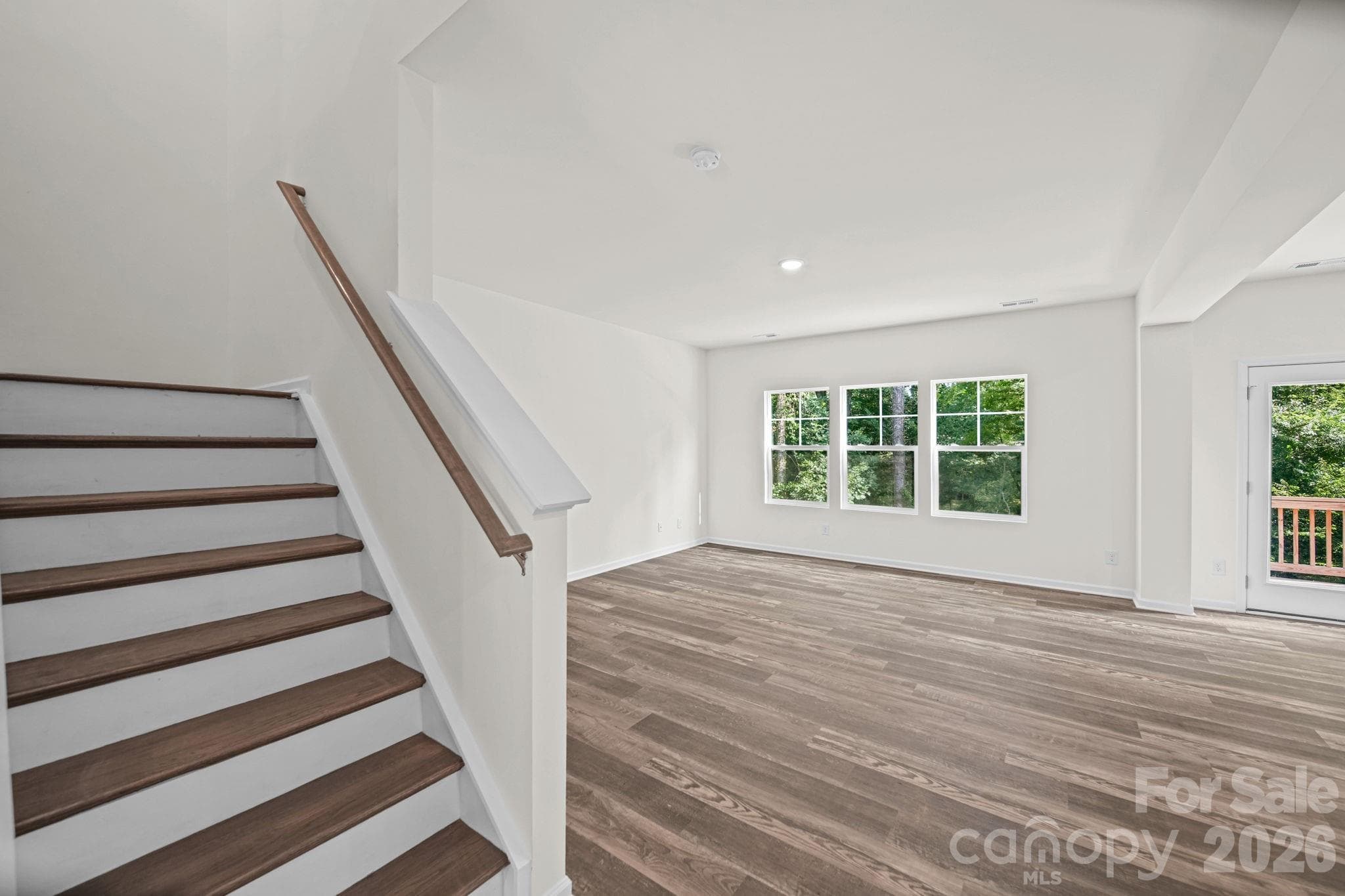 Staircase and Great Room - 7813 E Lane Drive, Charlotte