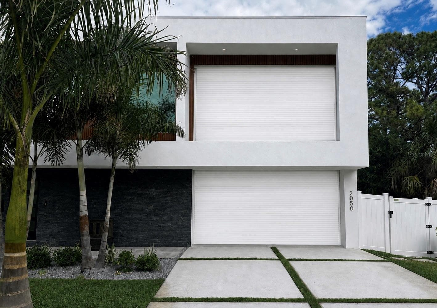 Modern exterior with tropical landscaping. - 2050 EUCLID TER, SARASOTA