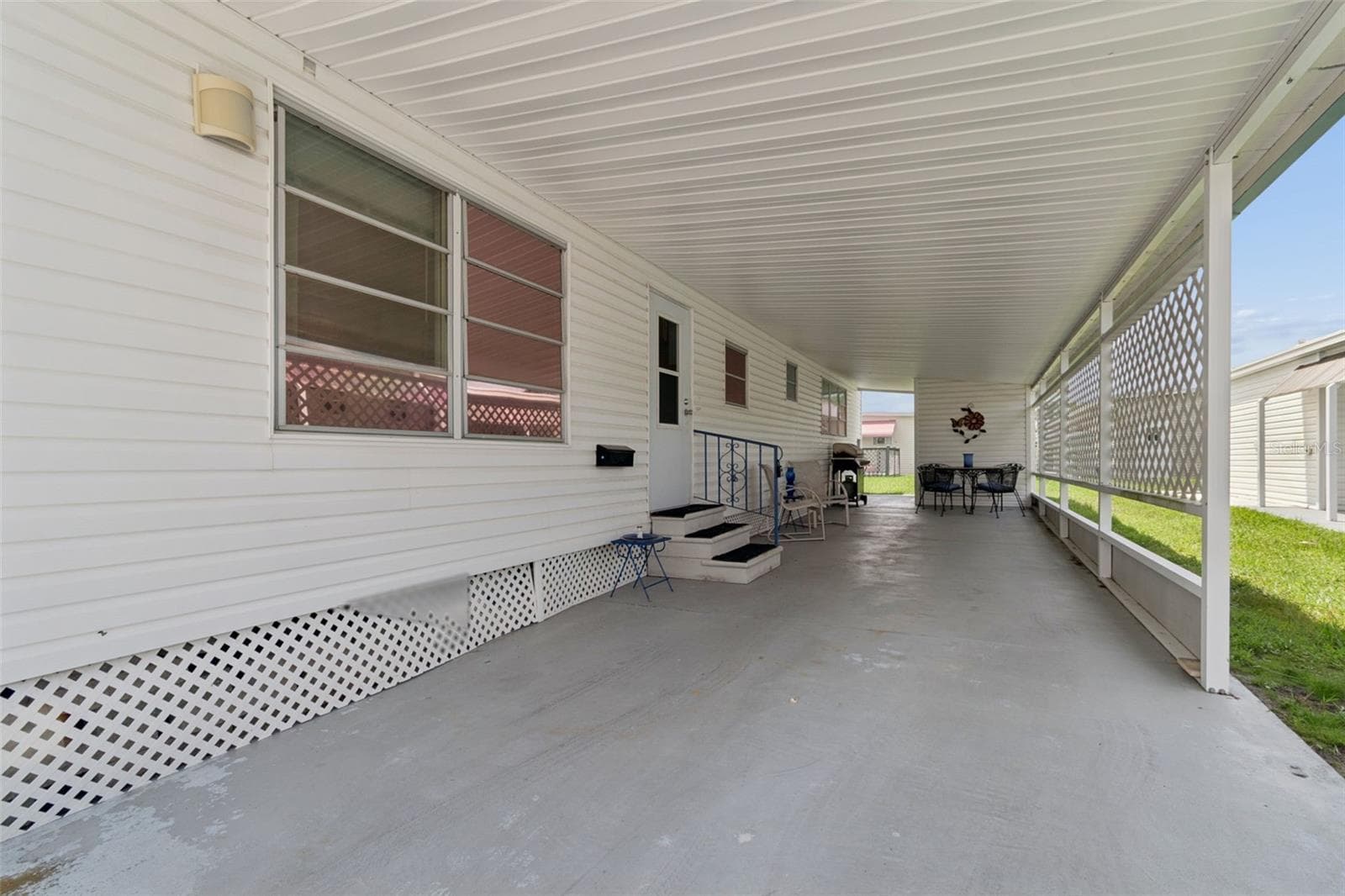 Mobile Home at 18675 US HIGHWAY 19 N #116, CLEARWATER, photo 5 of 70