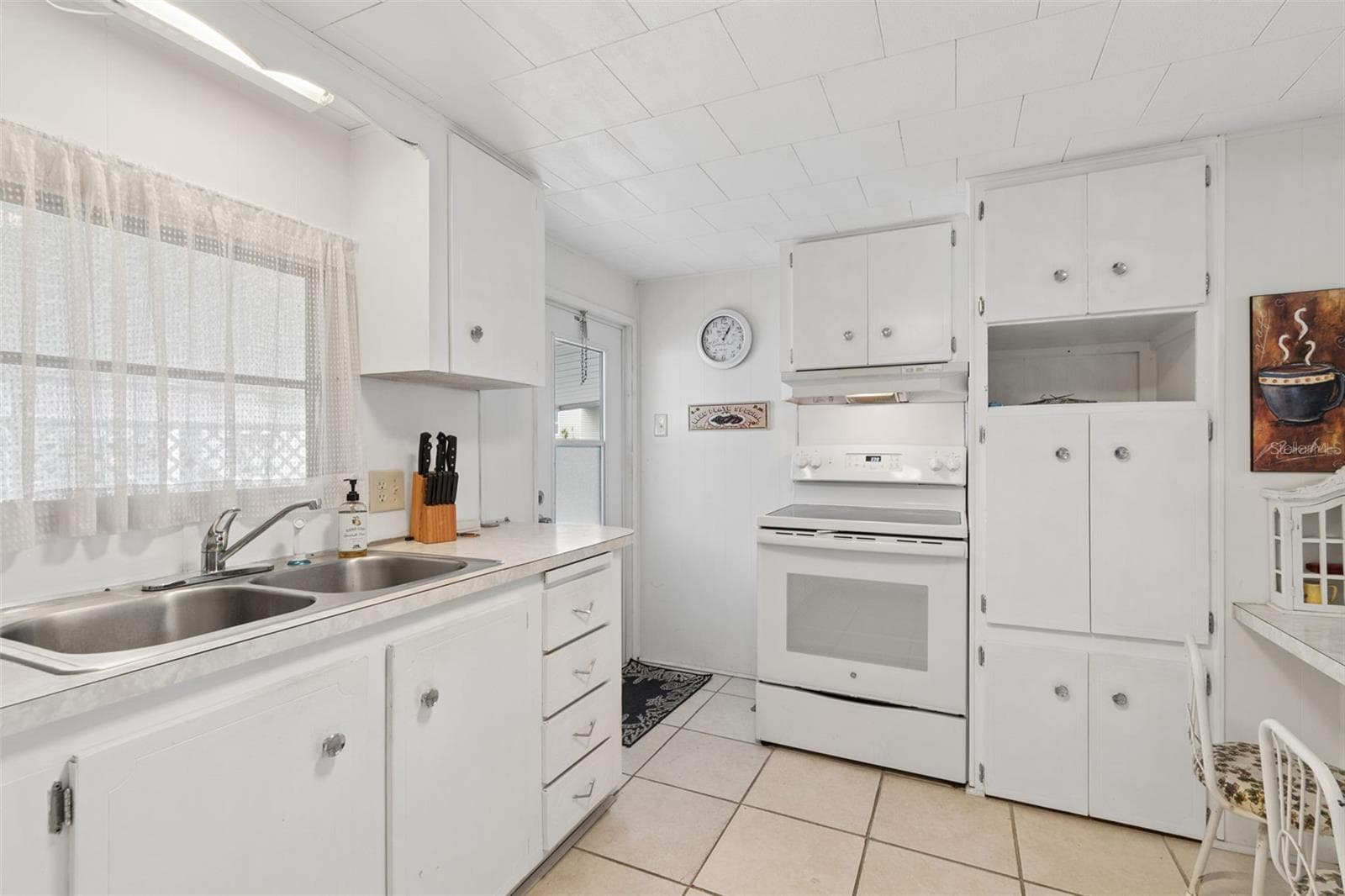 Mobile Home at 18675 US HIGHWAY 19 N #116, CLEARWATER, photo 8 of 70