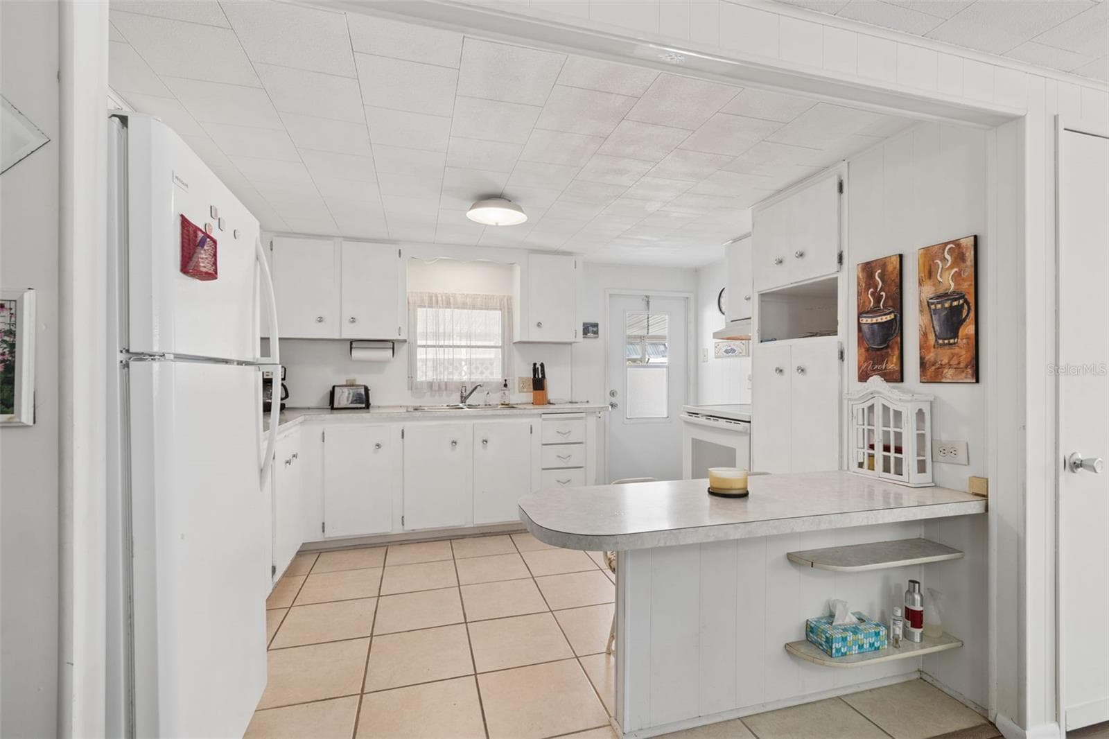 Mobile Home at 18675 US HIGHWAY 19 N #116, CLEARWATER, photo 11 of 70