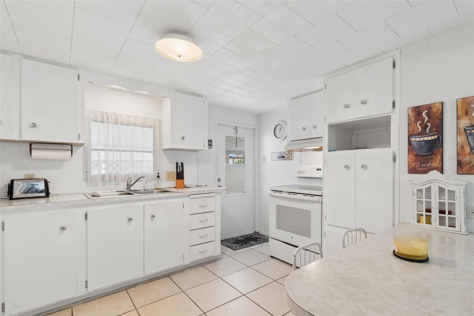 Mobile Home at 18675 US HIGHWAY 19 N #116, CLEARWATER, photo 12 of 70