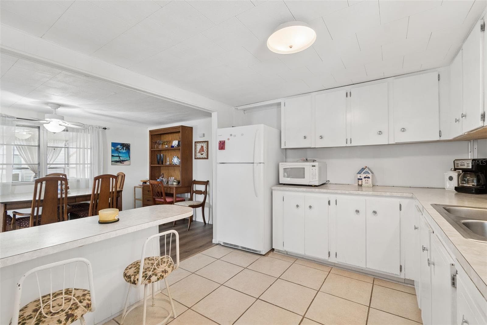 Mobile Home at 18675 US HIGHWAY 19 N #116, CLEARWATER, photo 13 of 70