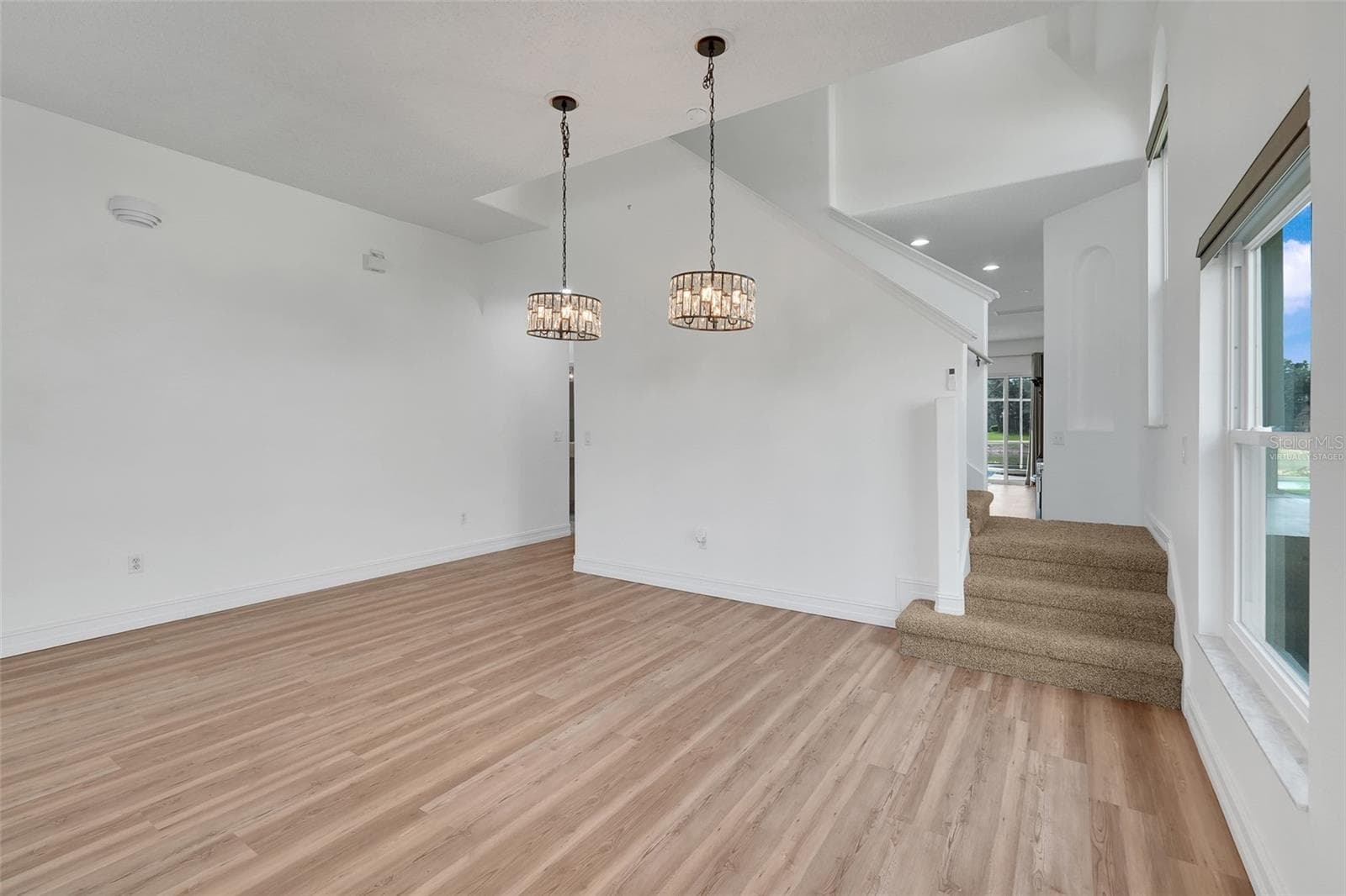 Virtually staged dining room - 16740 GLENBROOK BLVD, CLERMONT