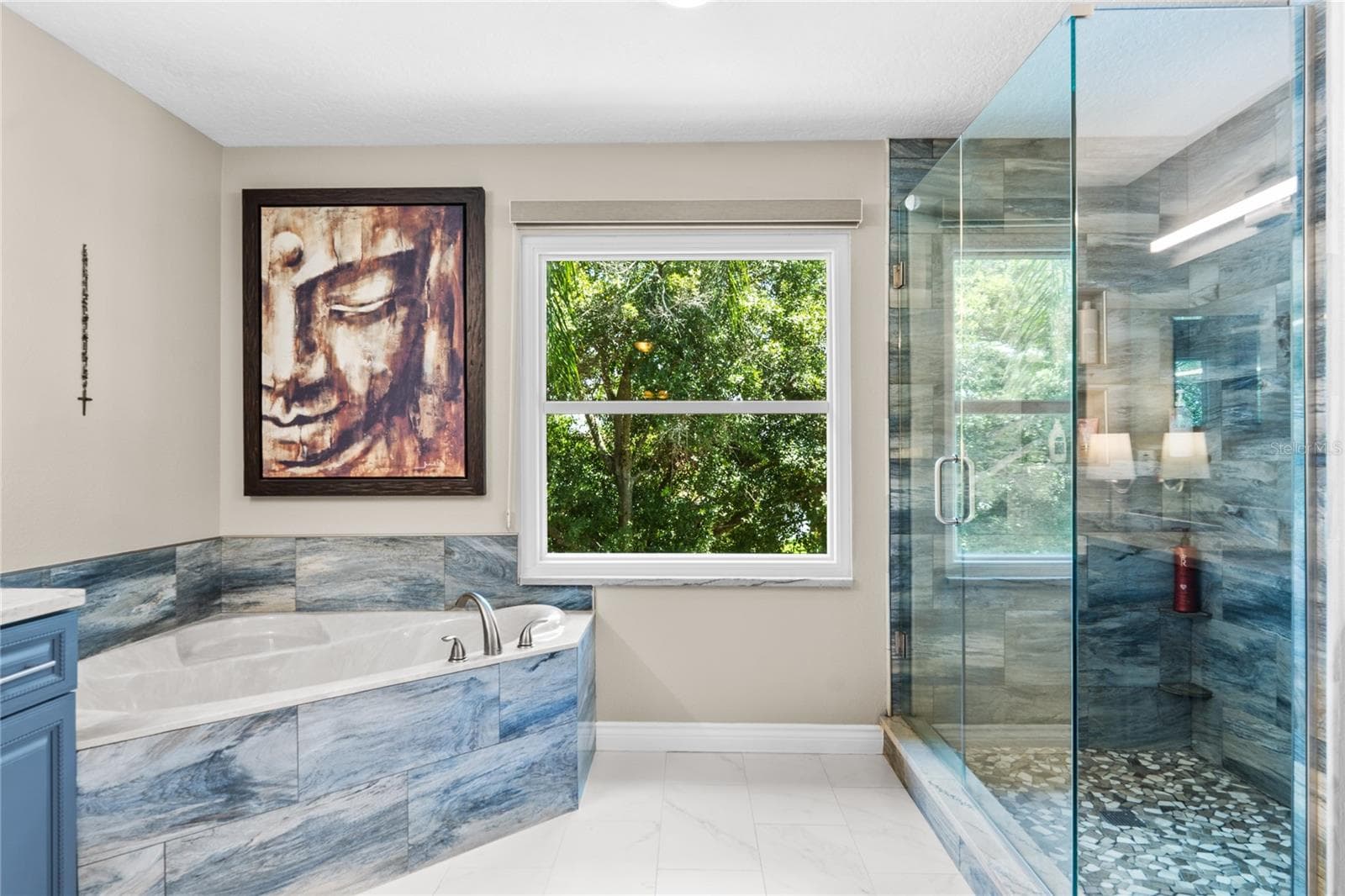 The owners bath has clean lines and high end finishes. - 483 VIA TUSCANY LOOP, LAKE MARY