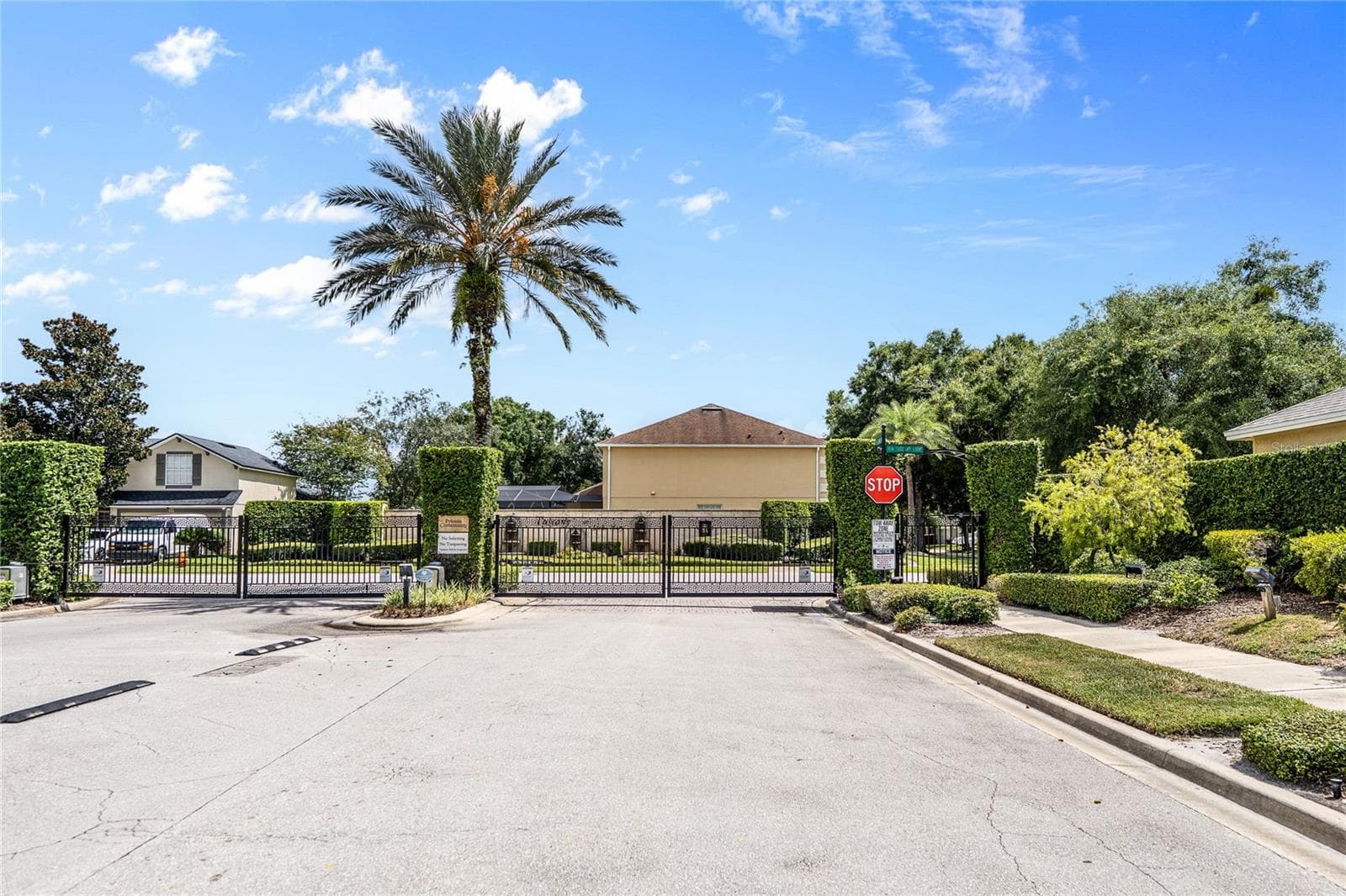 Entry to the gated community. - 483 VIA TUSCANY LOOP, LAKE MARY