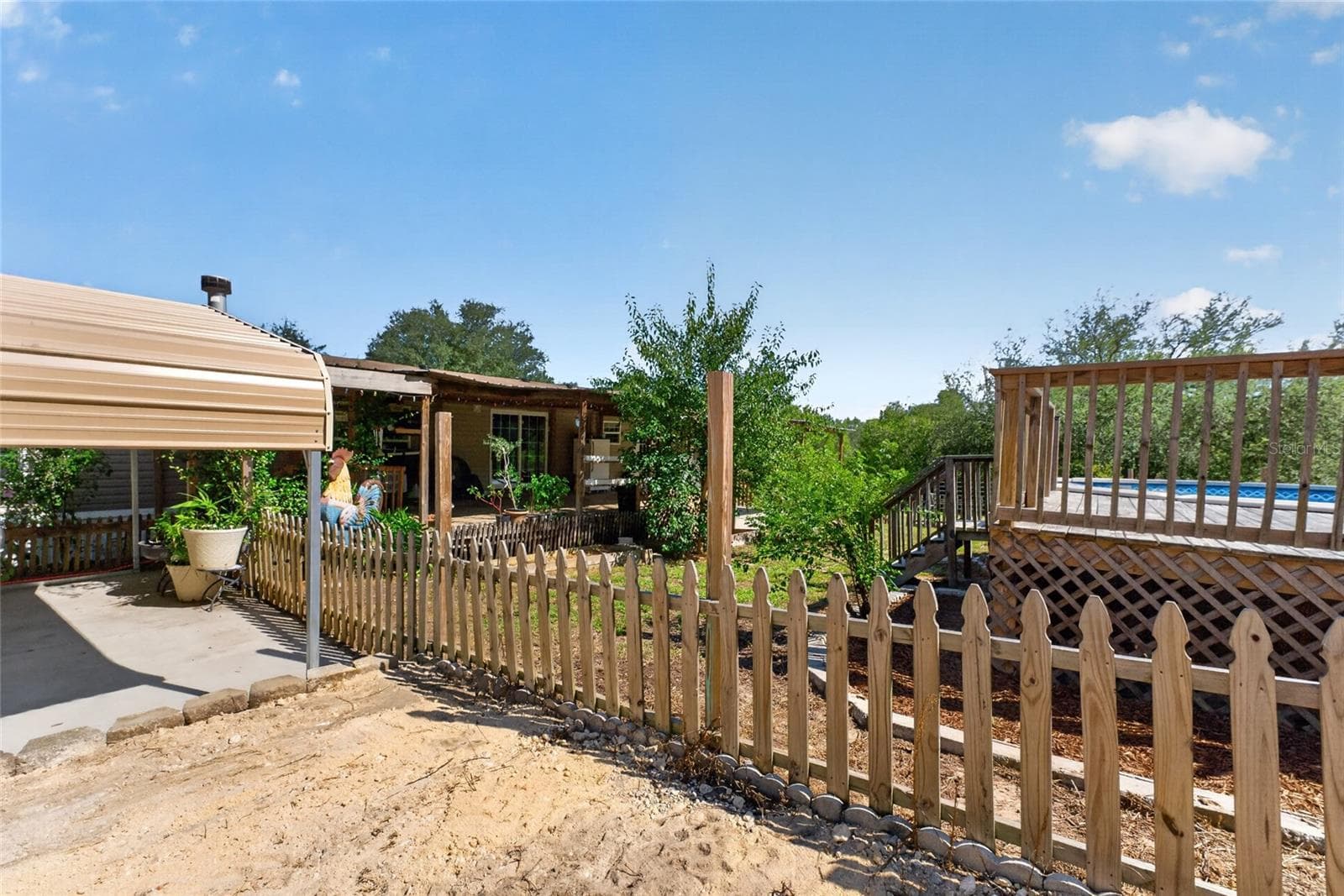 Fenced yard, fruit trees & swimming pool - 4830 NE 121 AVE, WILLISTON