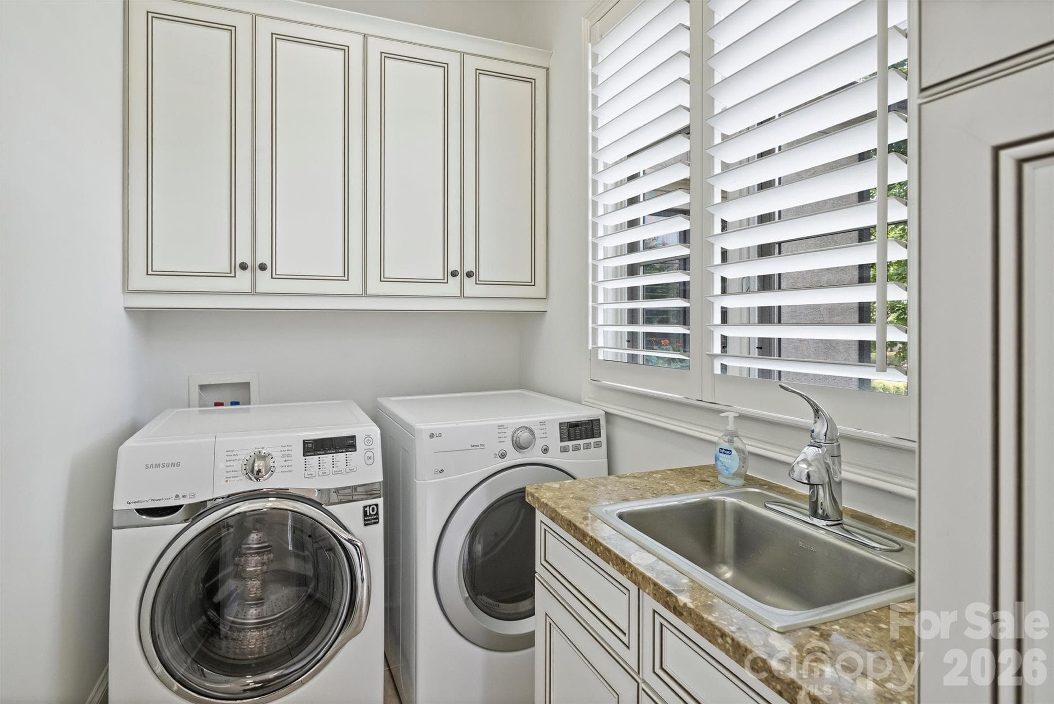 Laundry Room with cabinets and utility sink - 6223 Calley Glenn Lane, Charlotte