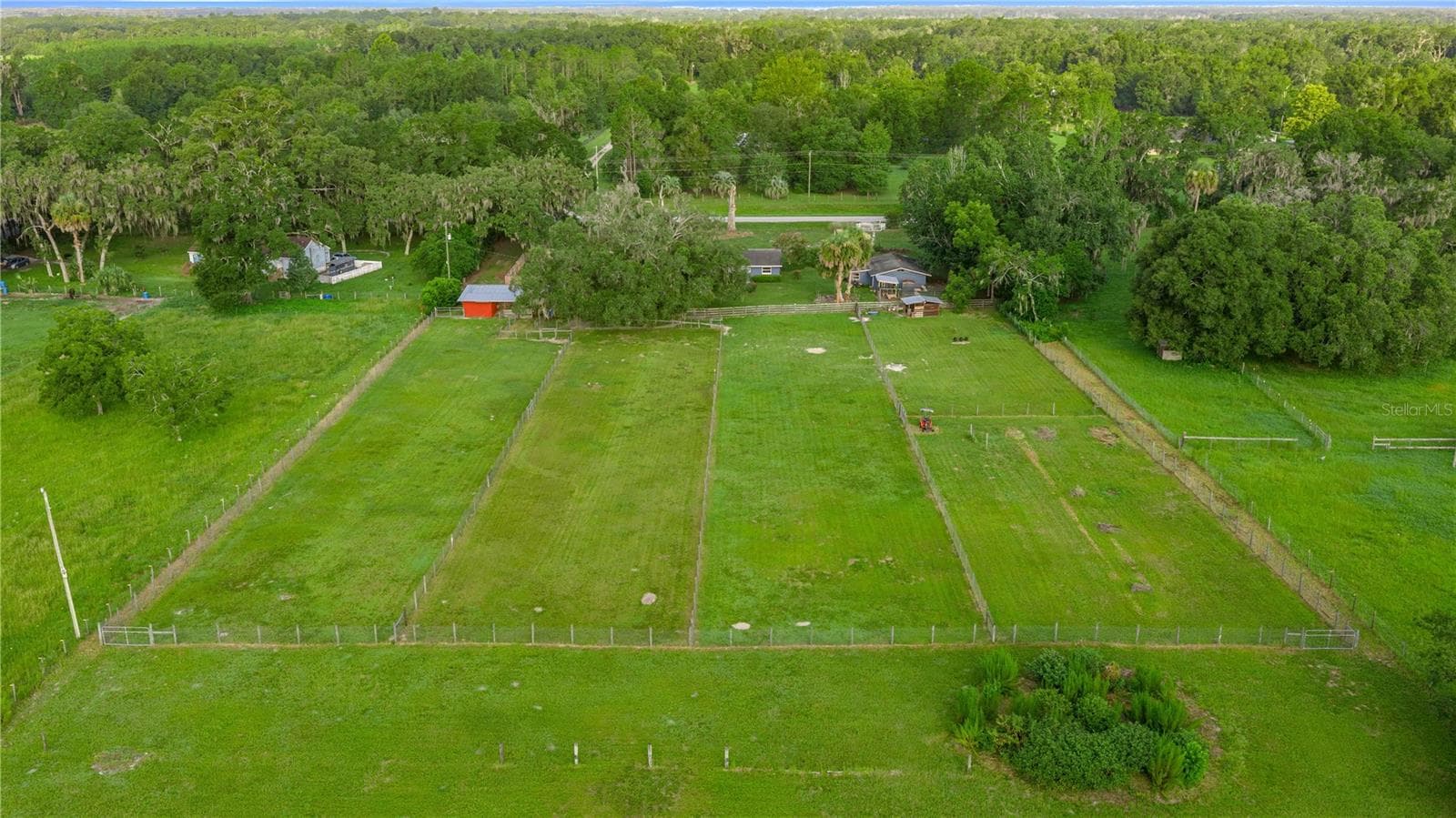 View of the 6 pastures from the back - 15027 SW 91ST ST, ARCHER