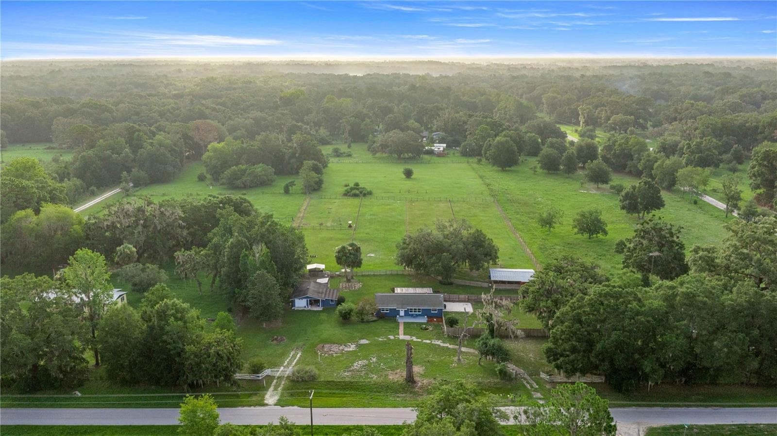 Front overview of the property from the paved road. - 15027 SW 91ST ST, ARCHER