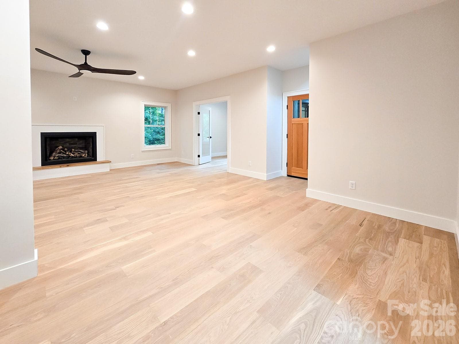 Living looking towards front door and office - 505 S Oconeechee Avenue, Black Mountain
